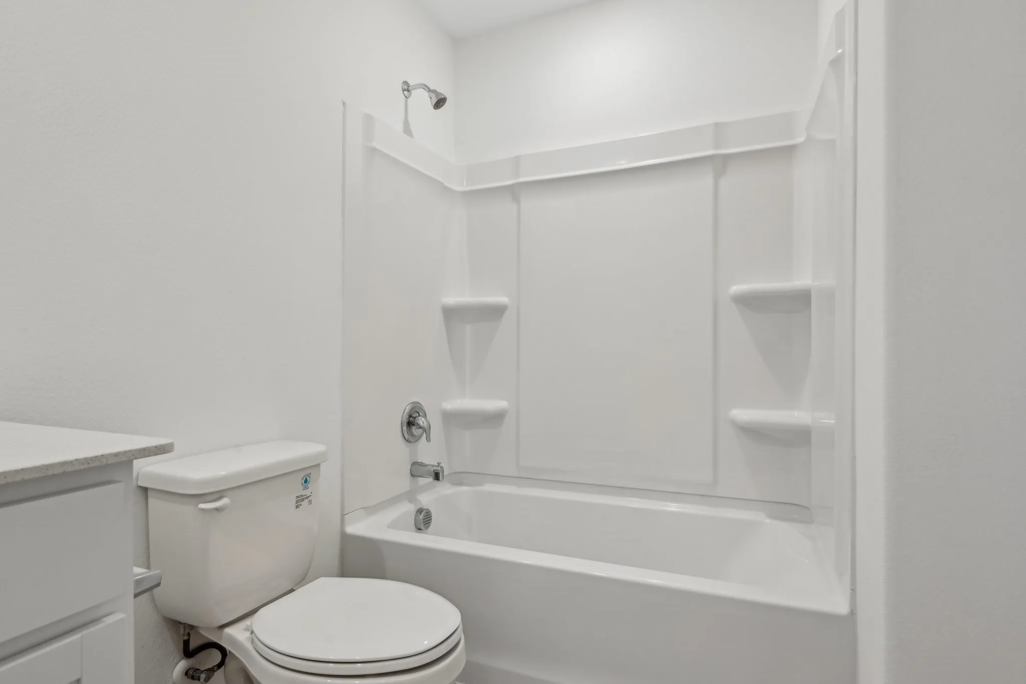 Full bathroom with vanity, toilet, and bathing tub / shower combination