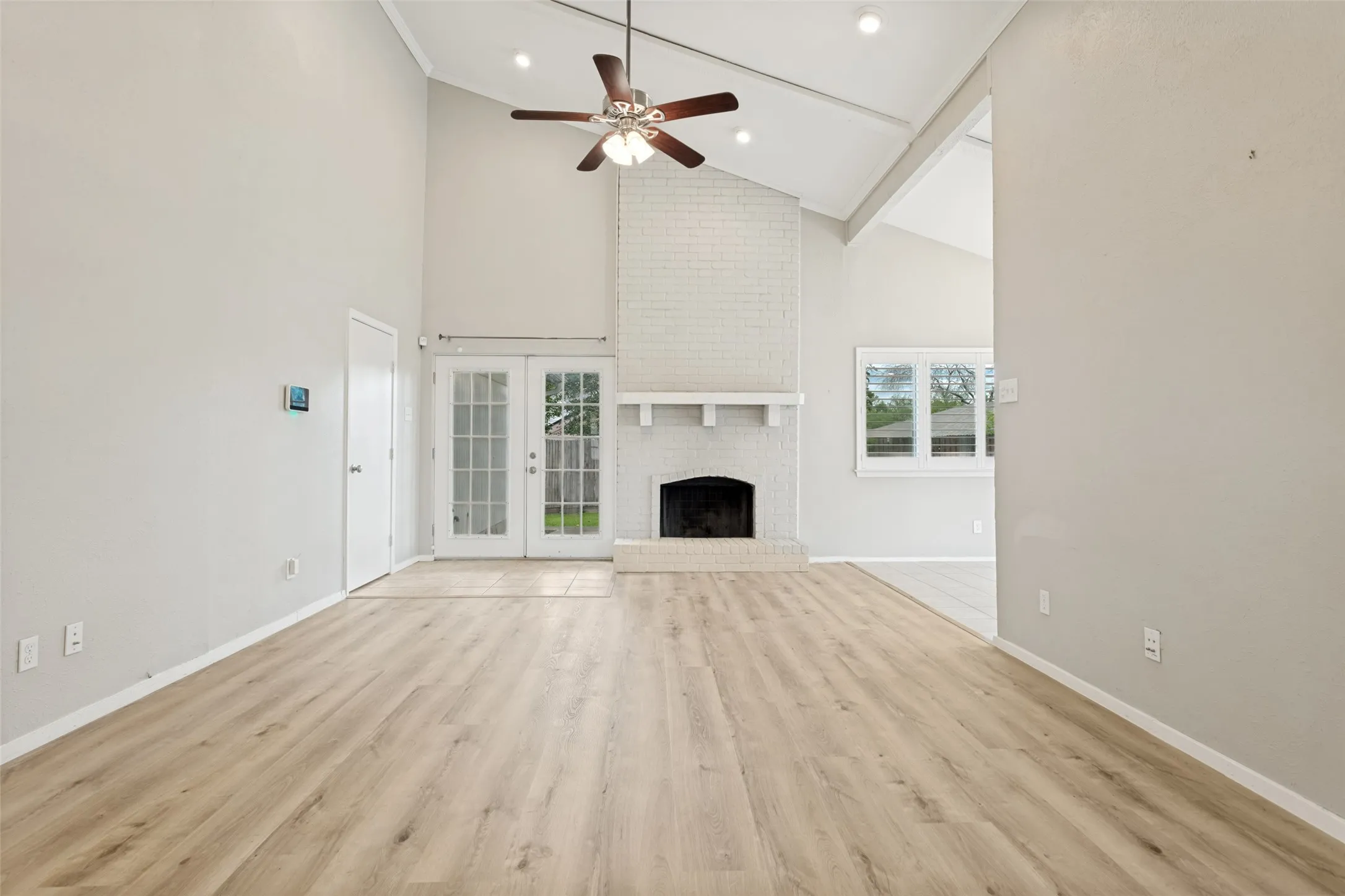Wood burning fireplace and high ceilings