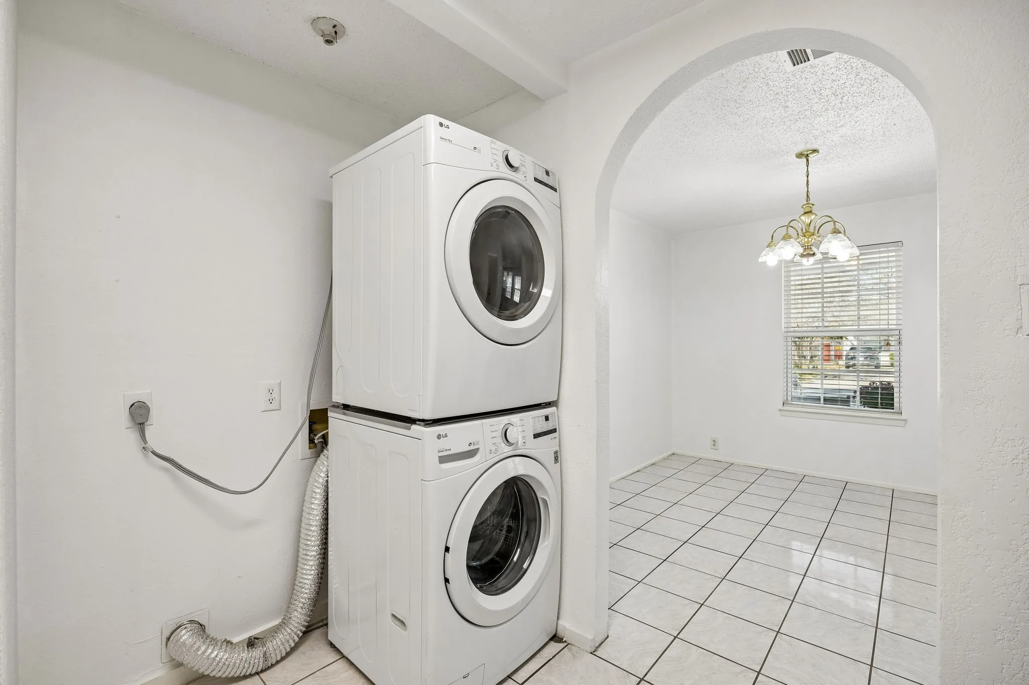 Laundry located in the kitchen.