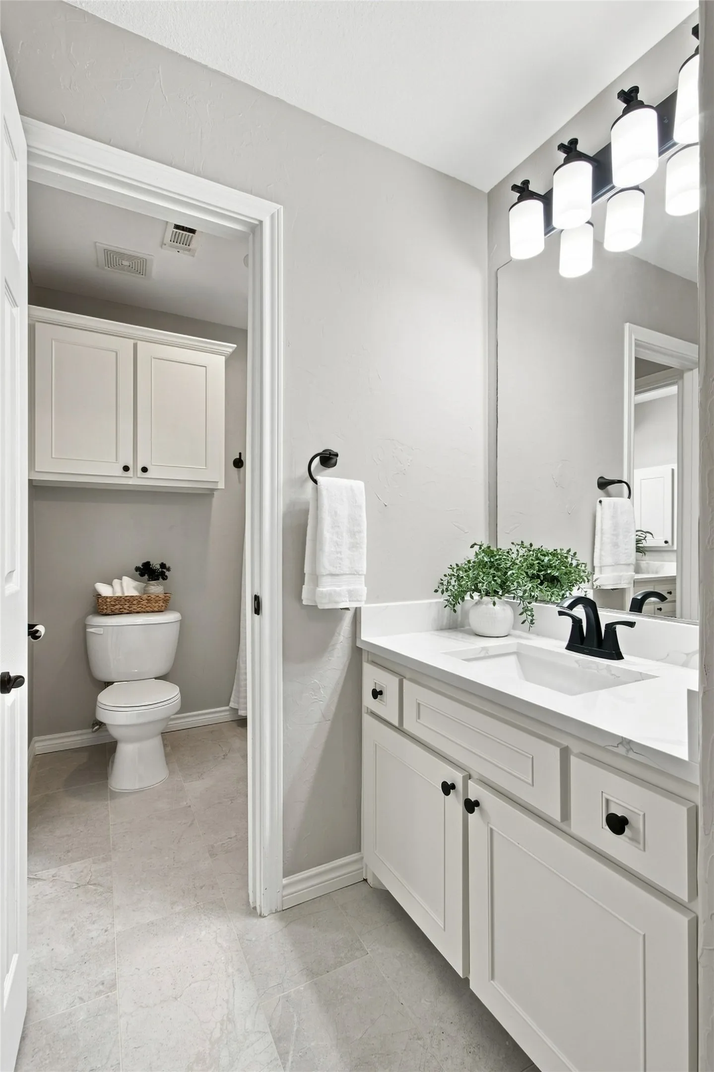 Jack and Jill bathroom connects two upstairs bedrooms