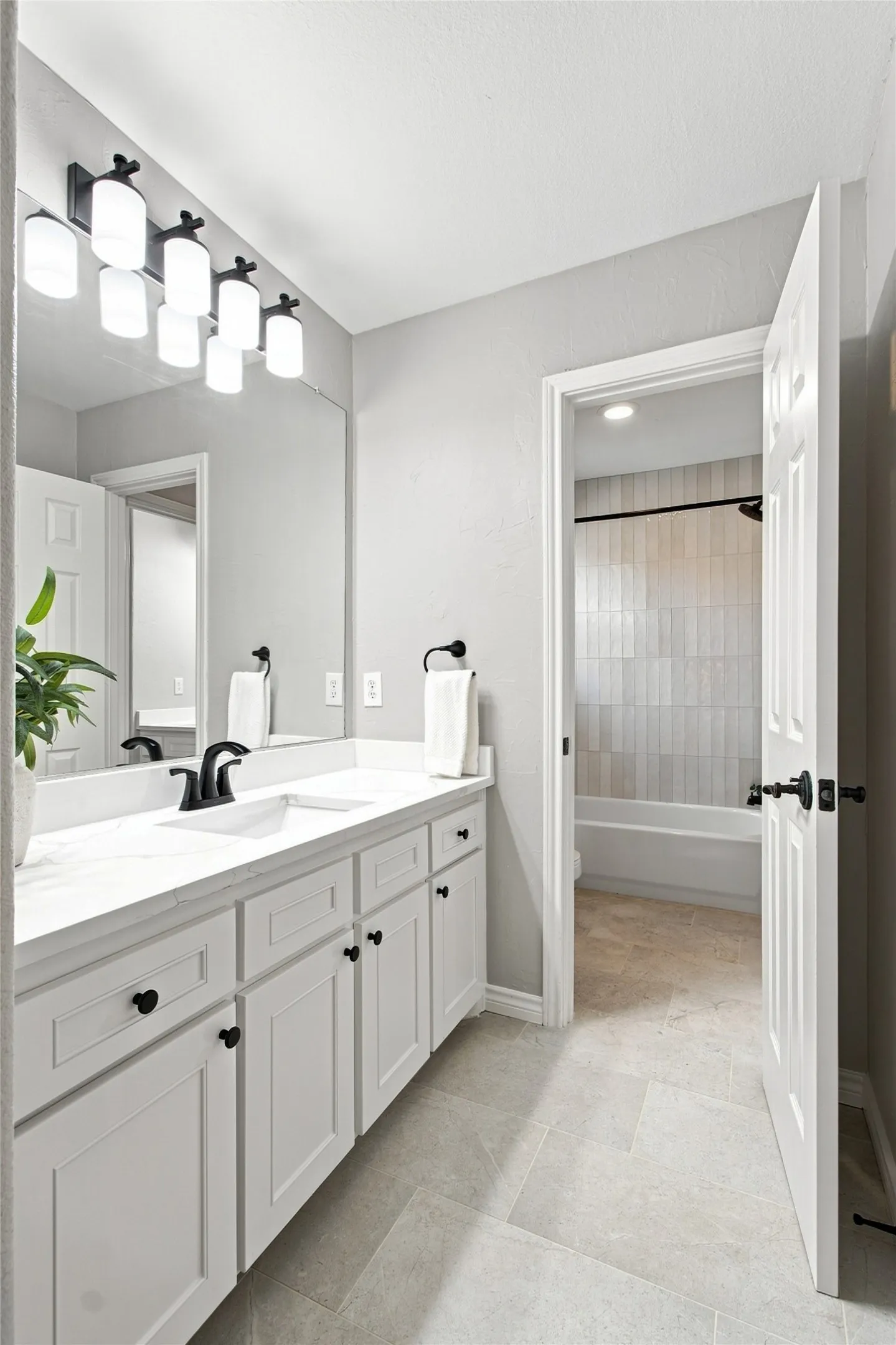 Jack and Jill bathroom connects two upstairs bedrooms.