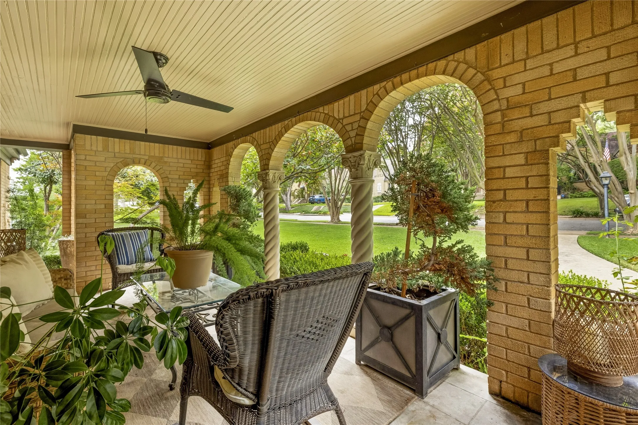 Inviting covered front porch with iconic archways