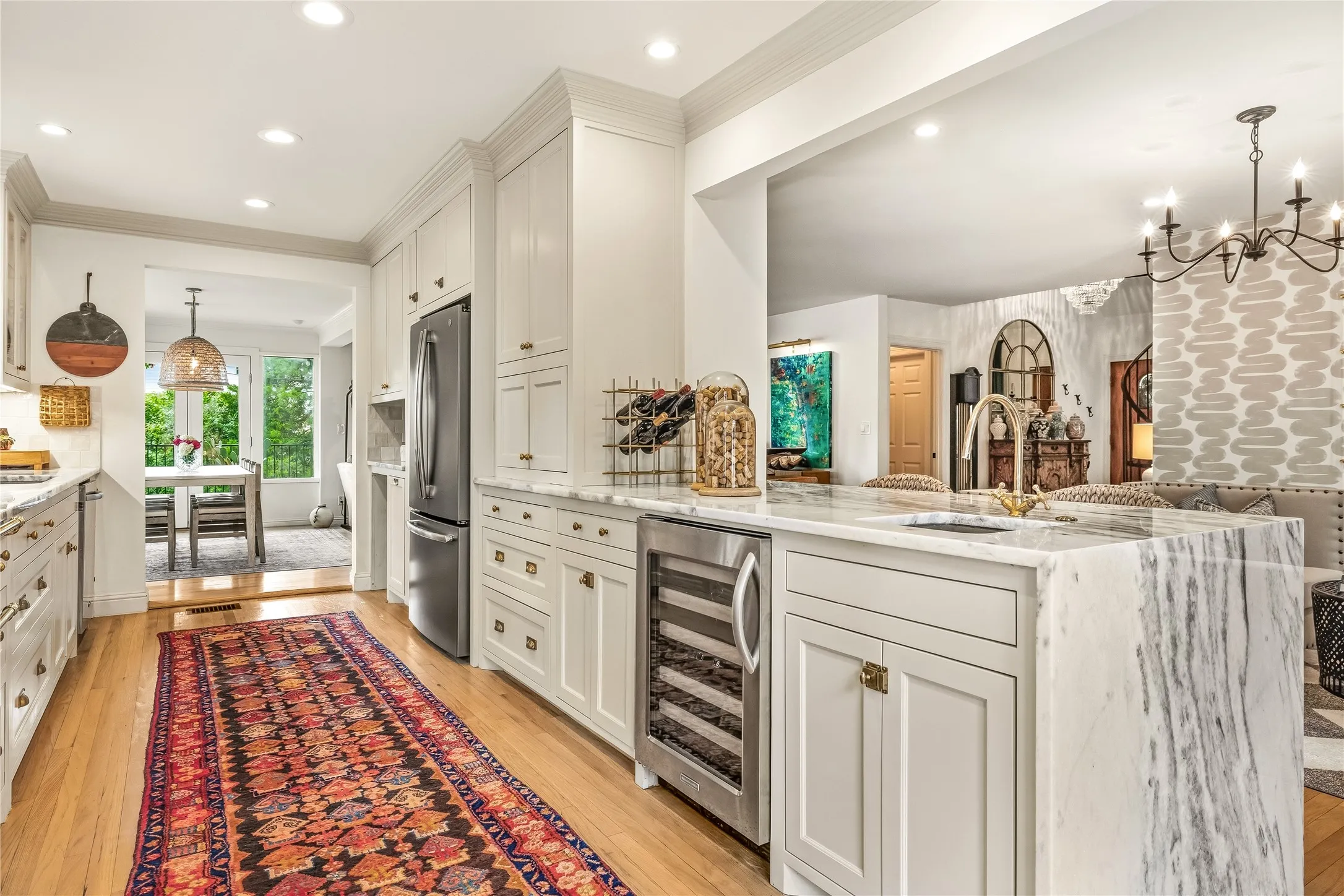 Waterfall marble countertops and Inset cabinets