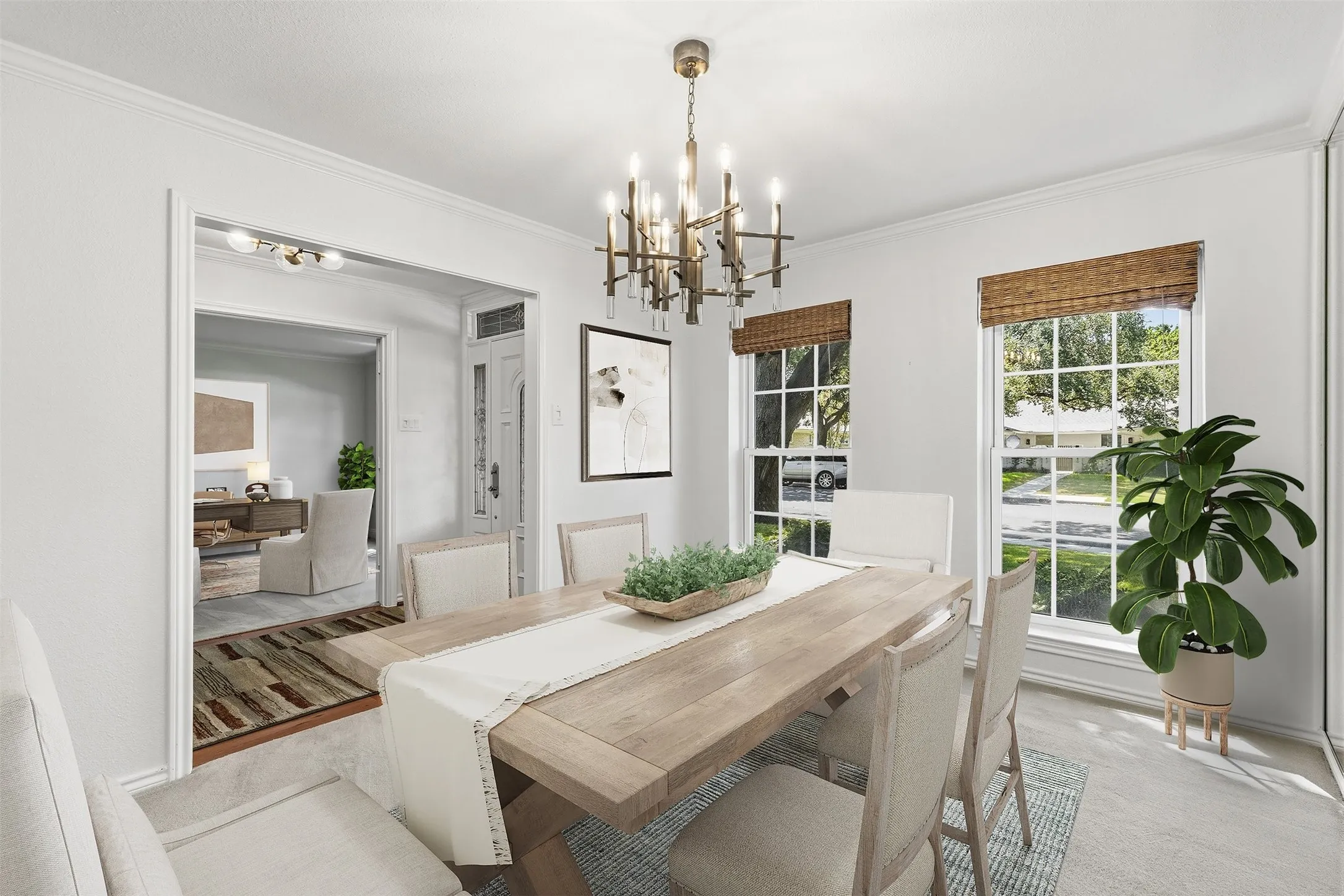 Formal dining area at the front of the house with lovely natural light....*virtually staged to show potential*
