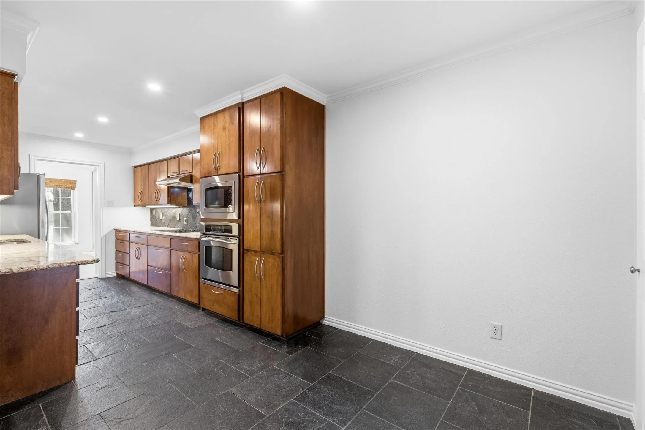 Stainless oven, microwave and pantry tower...