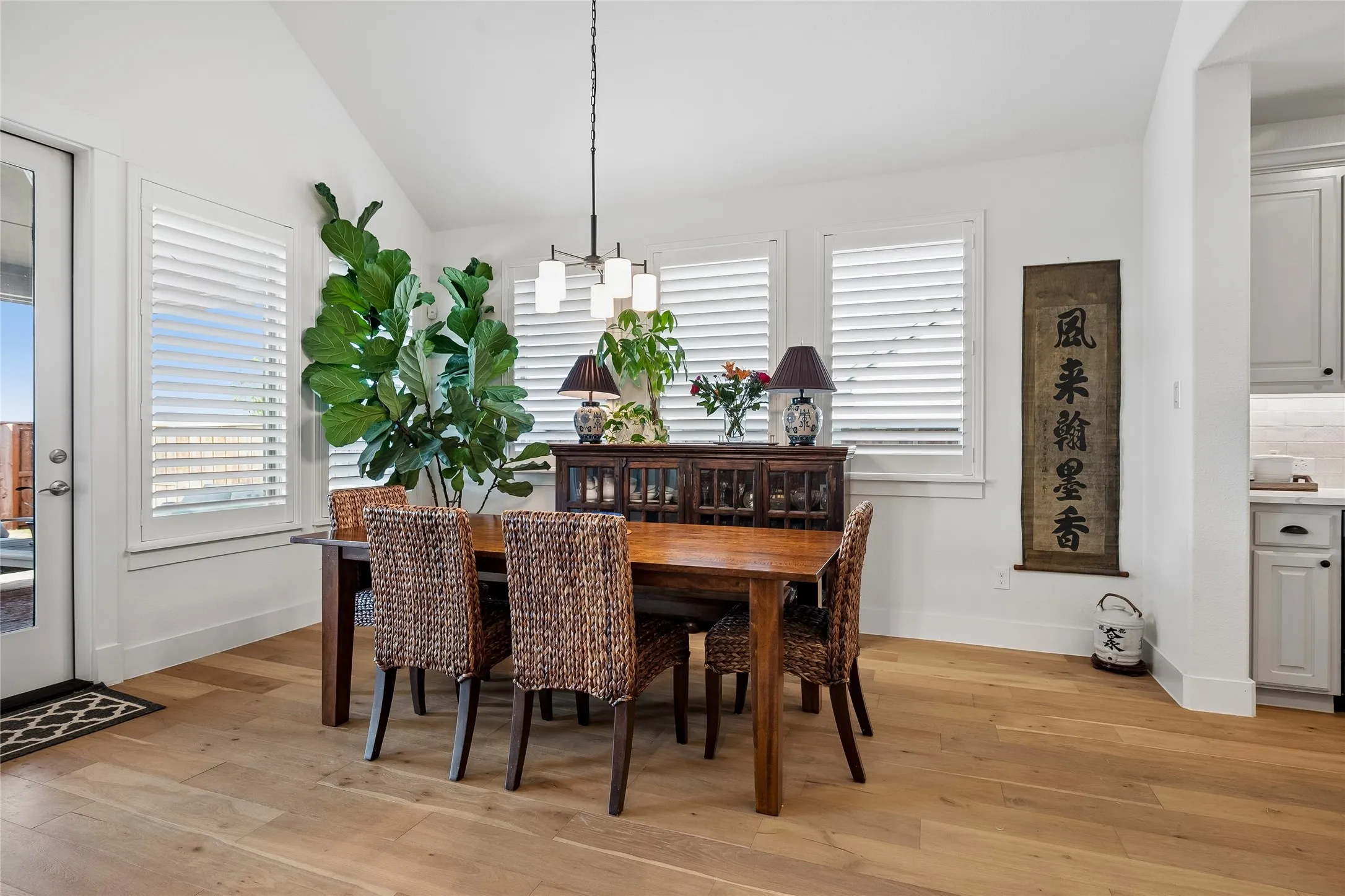 The dining area opens to the inviting covered patio.