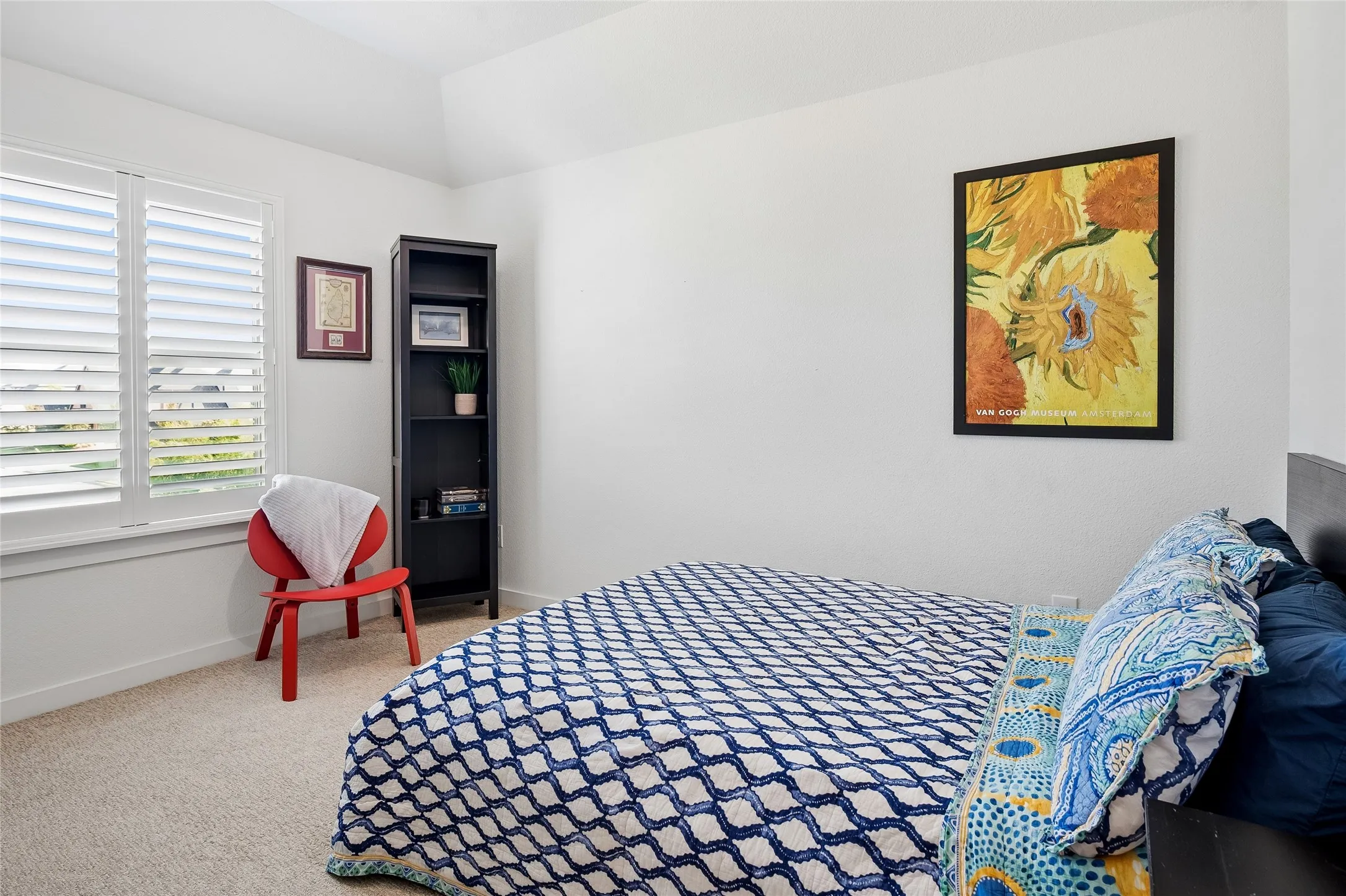 Secondary bedroom upstairs, also viewing front yard