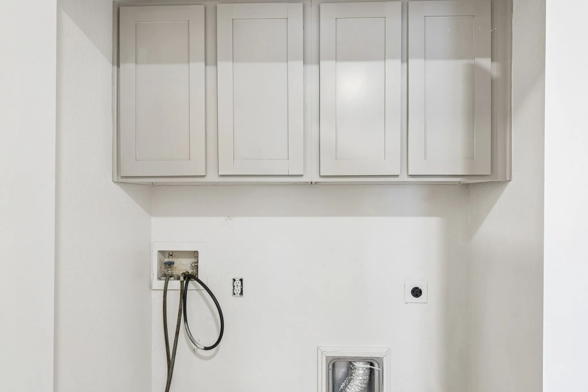Upper cabinetry with shaker-style doors
