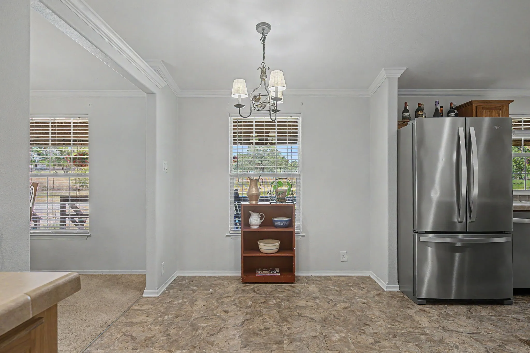 Separate breakfast nook area with chandelier