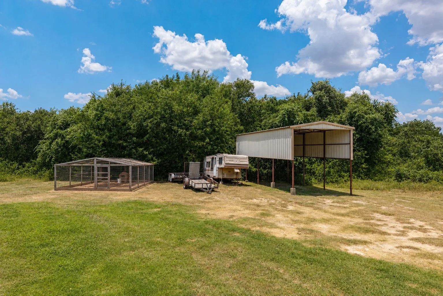 As well as a double-wide RV carport and a 16'x16' chicken coop.