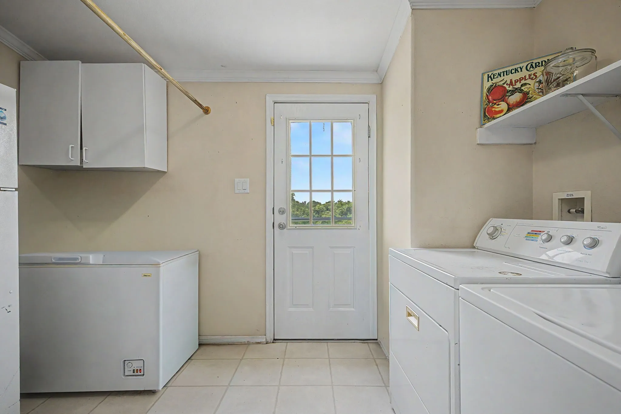 A laundry room everyone will enjoy. Big enough for freezer, AND a secondary fridge with drying rod across.