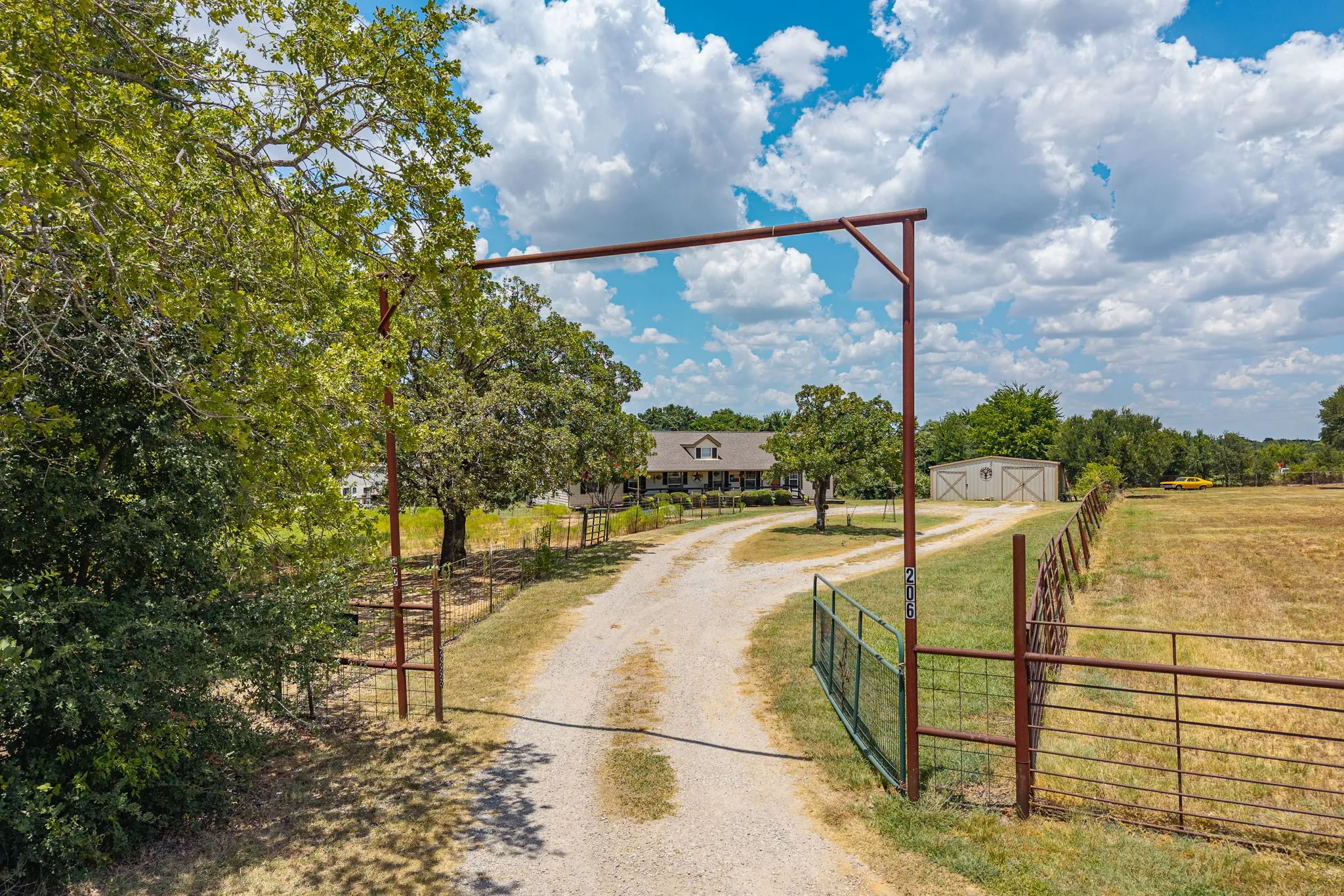 Parameter is fenced and complete with an entry gate onto the property.
