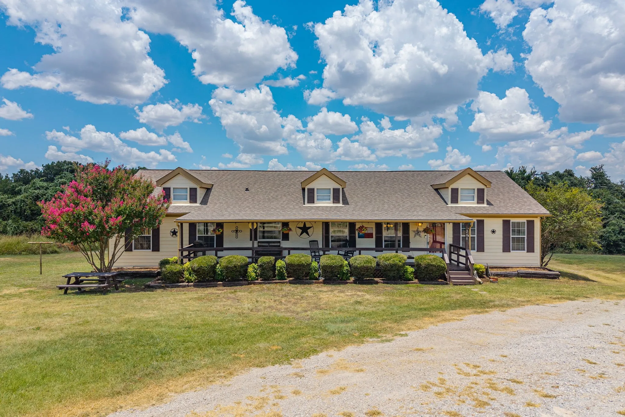 Nestled on 4.7 acres of unrestricted land, the possibilities are truly  endless.