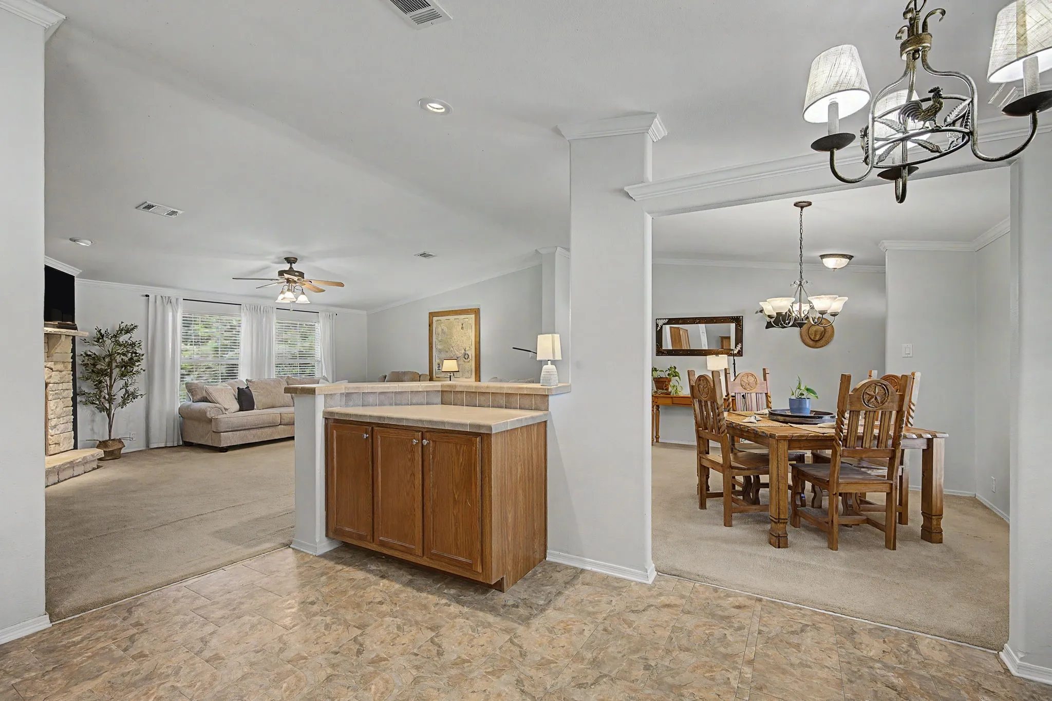 The kitchen offers plenty of room for guests, and countertop space for entertaining or cooking.