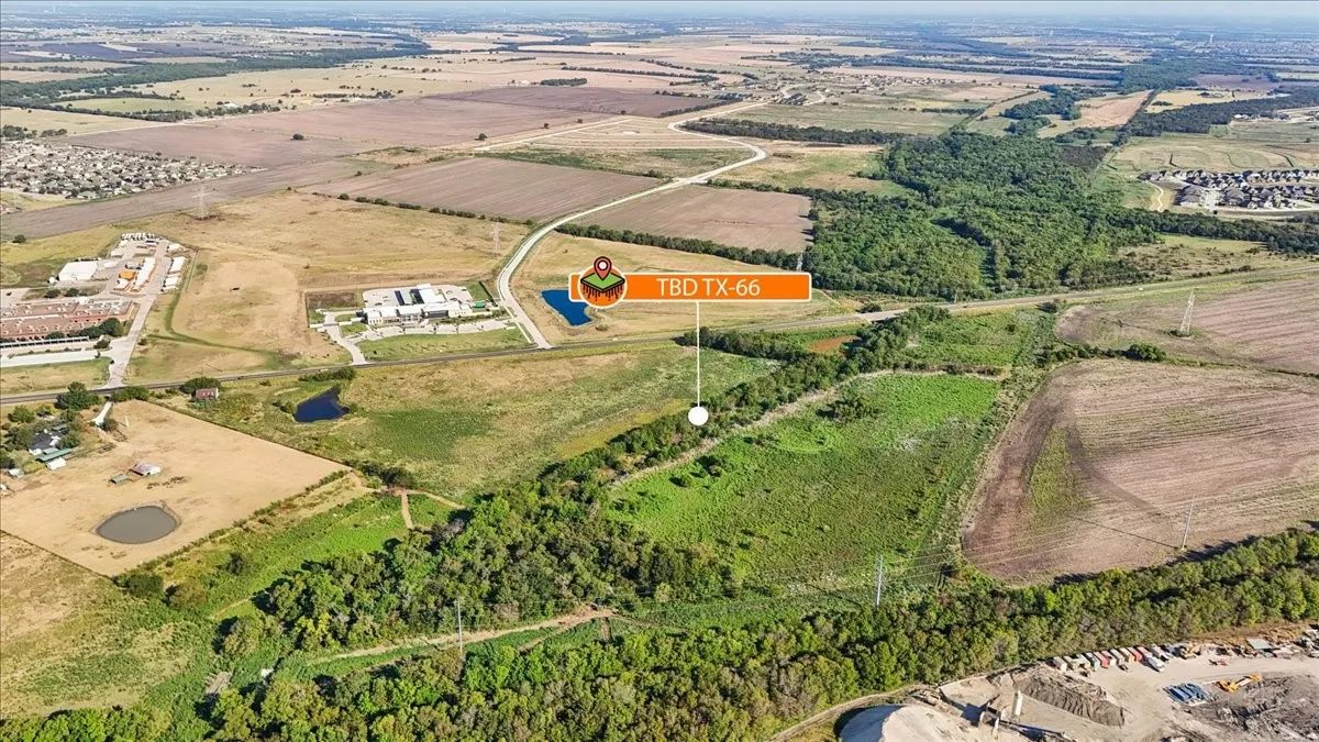 Expansive land parcel featuring natural waterways and dense tree lines