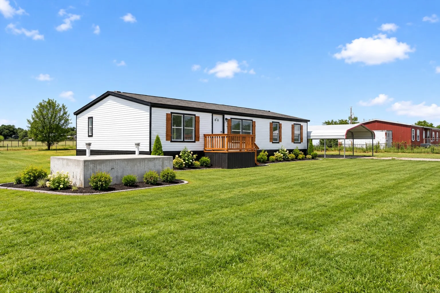 Grass and Landscape is AI. White exterior siding with dark trim