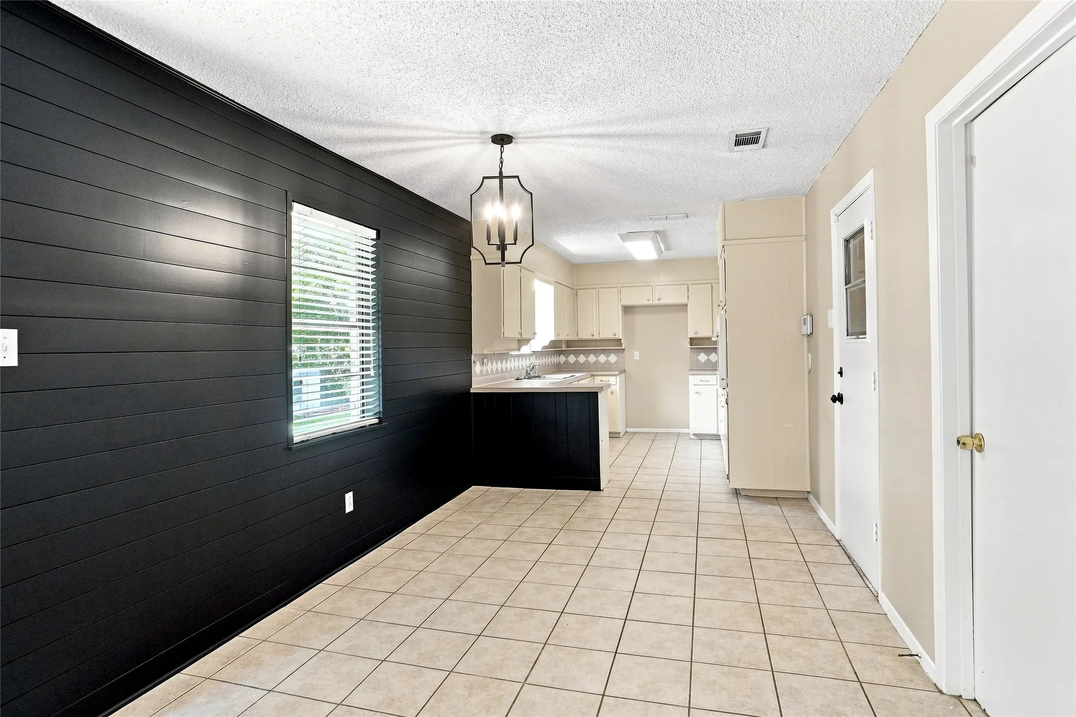Eating area  - NOTE: door to right White door -into Large Utility Rm..