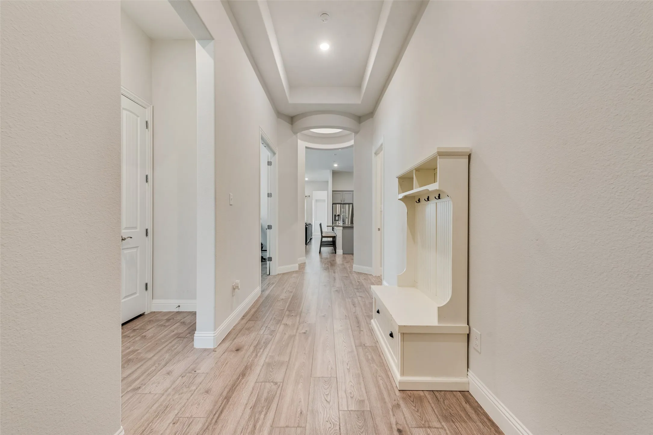 Front entry with engineered hardwood floors and 11 ft ceilings at 1721 Pattenson Trl, Haslet, TX 76052 in Wellington subdivision