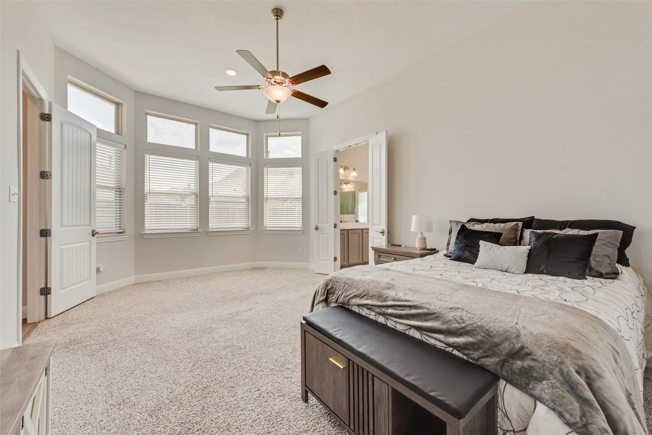 Spacious primary bedroom with 11 ft ceilings at 1721 Pattenson Trl, Haslet, TX 76052 in Wellington subdivision