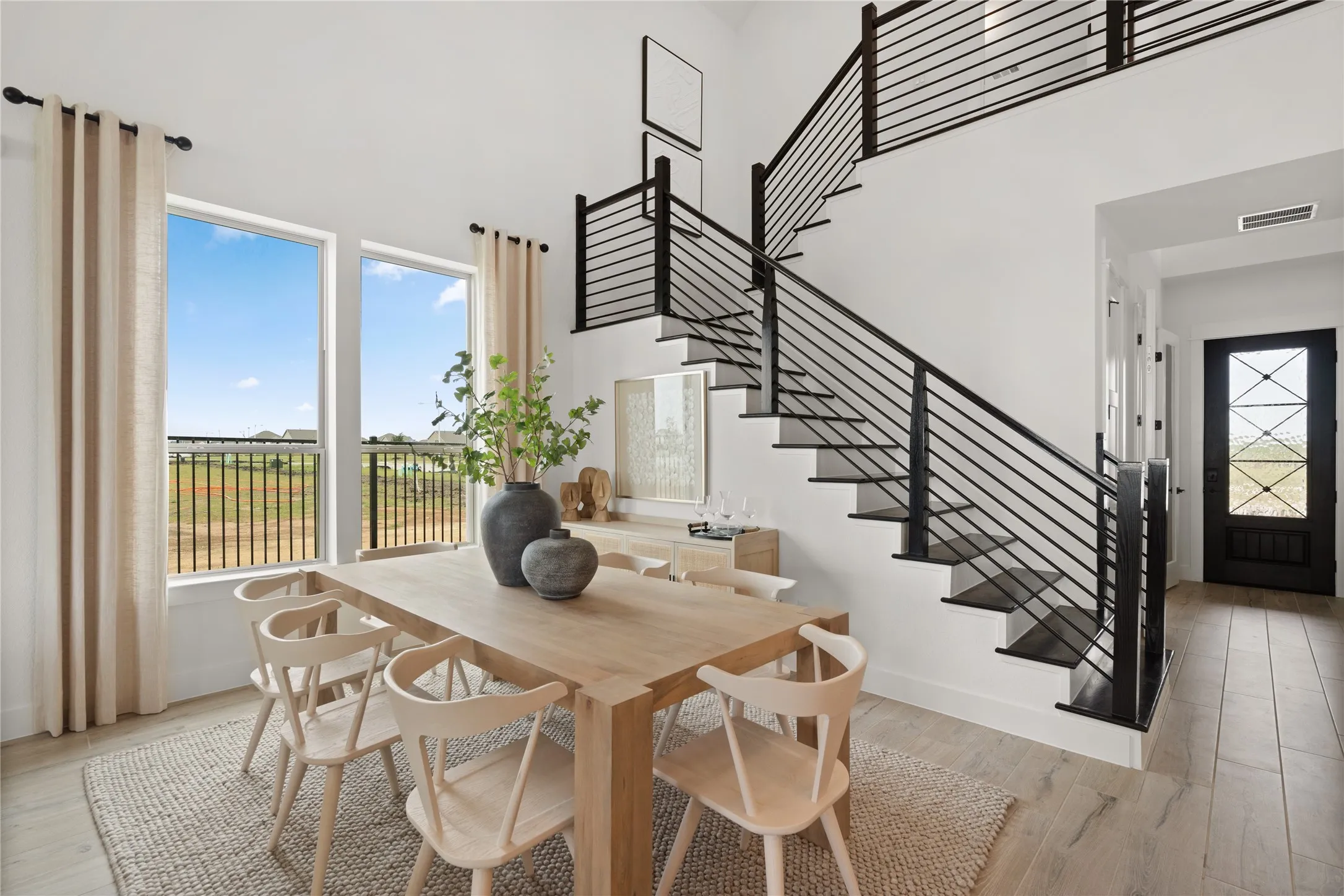*Model Representation - Dining area off kitchen with large windows