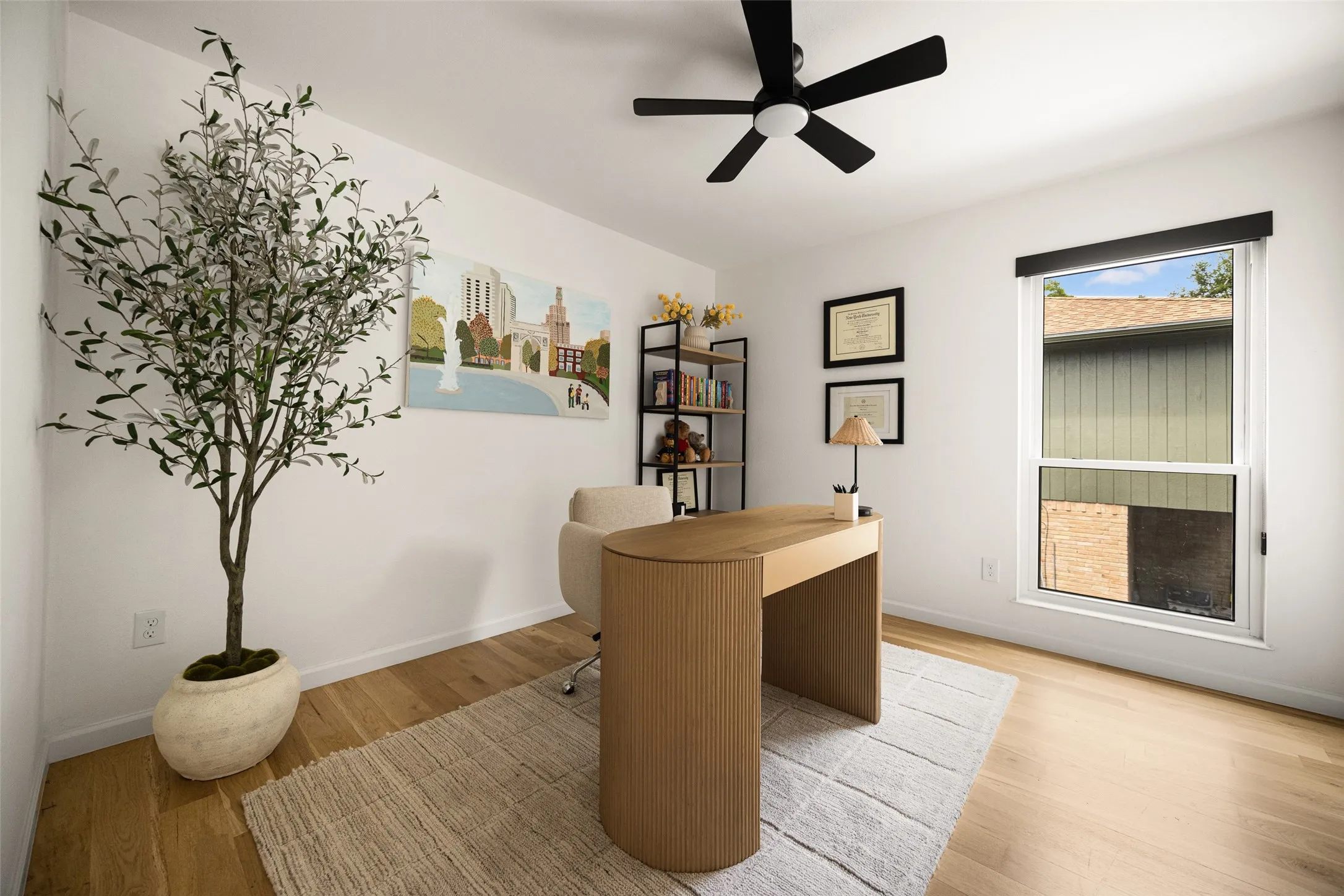 Hardwood-style flooring with white walls