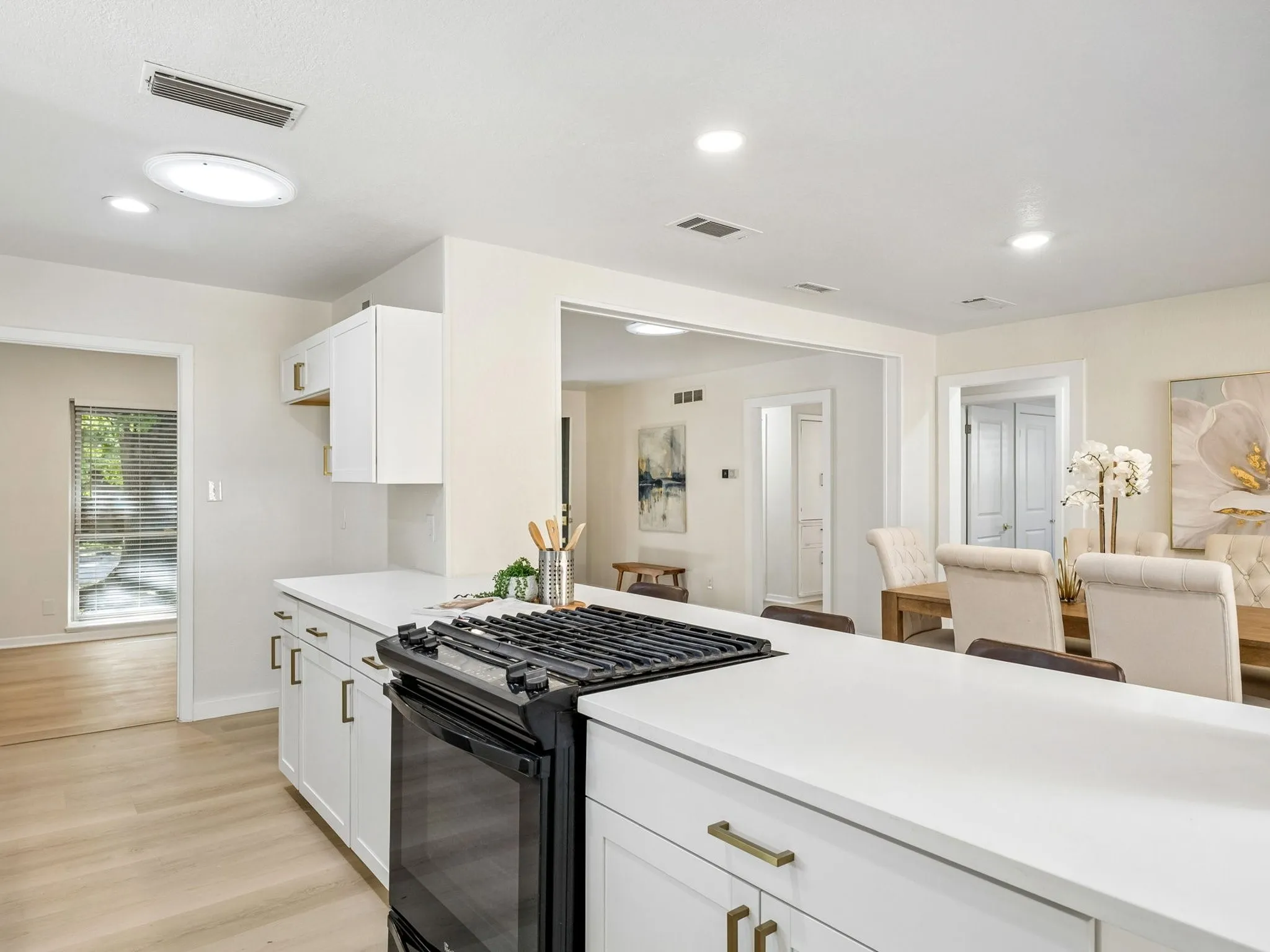 Kitchen is center pivot for 4 living areas