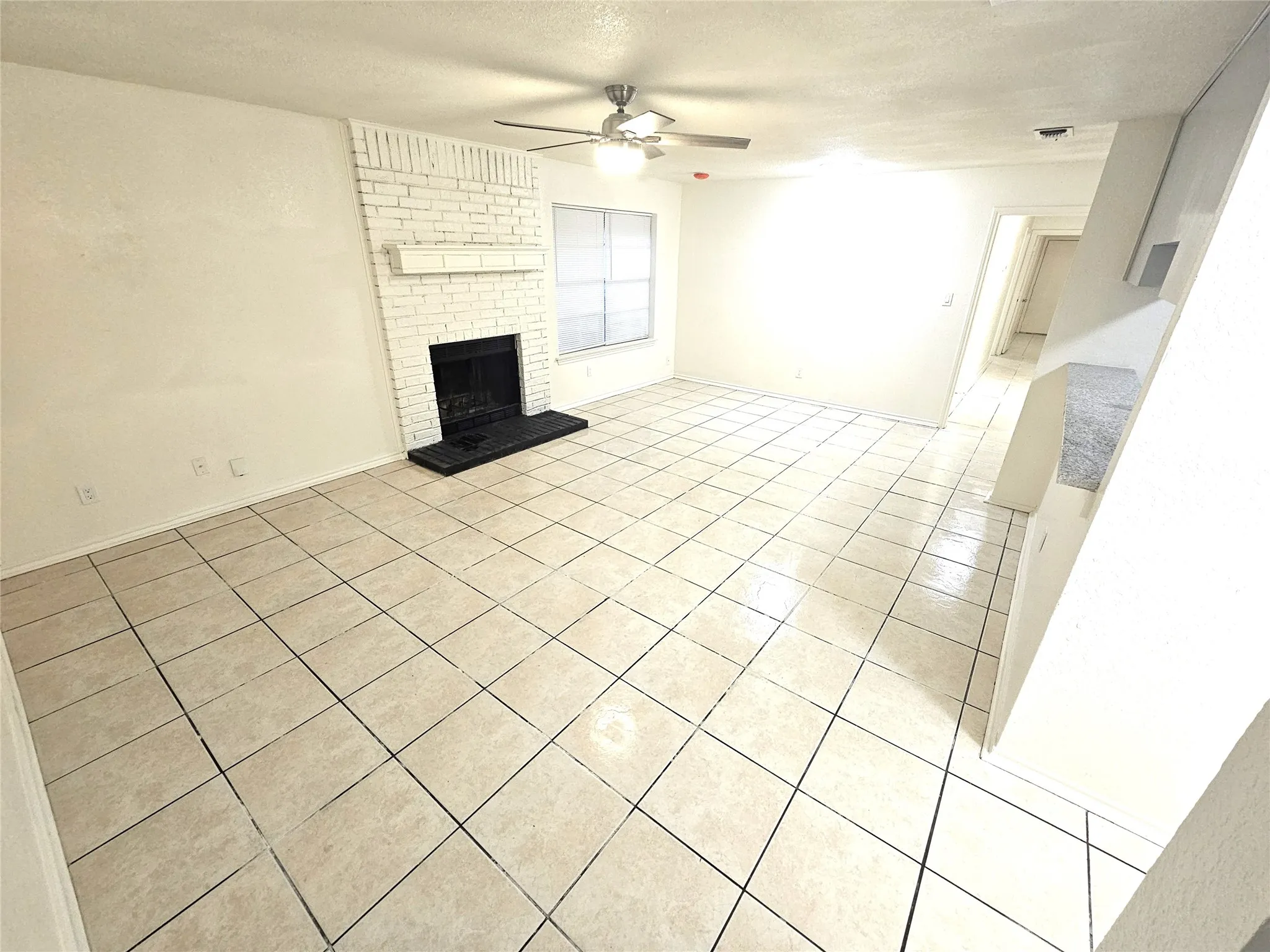 Big space living room with ceiling fan, fireplace. Open area to living and dining areas. (3425​​‌​​​​‌​​‌‌​‌‌​​​‌‌​‌​‌​‌​​​‌​​ Republic)