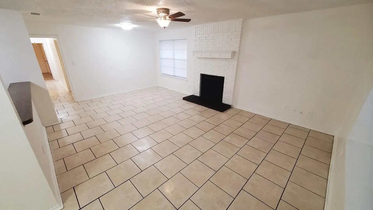 big space living room with fireplace (For 3427 Republic)
