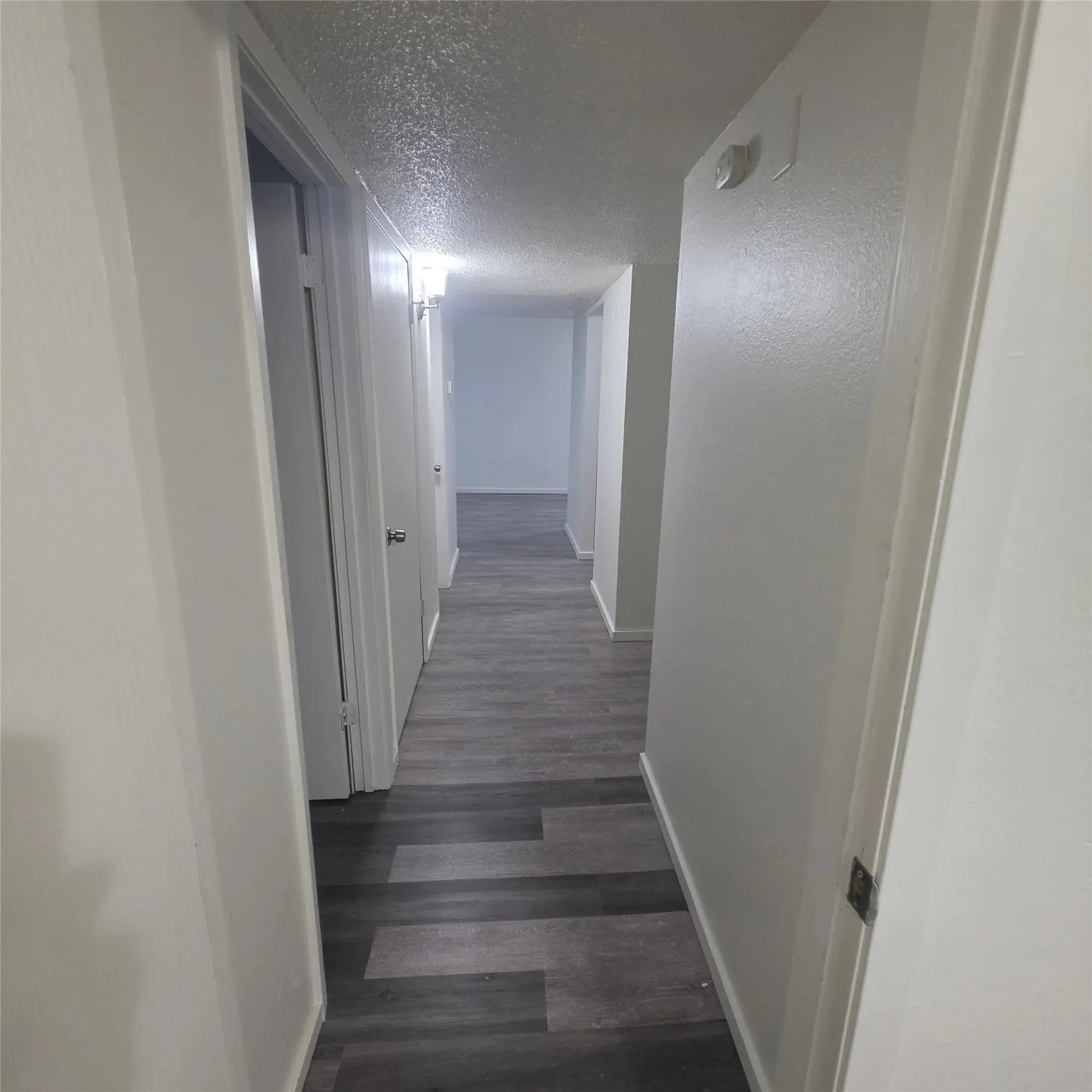 Light gray wood-finish flooring