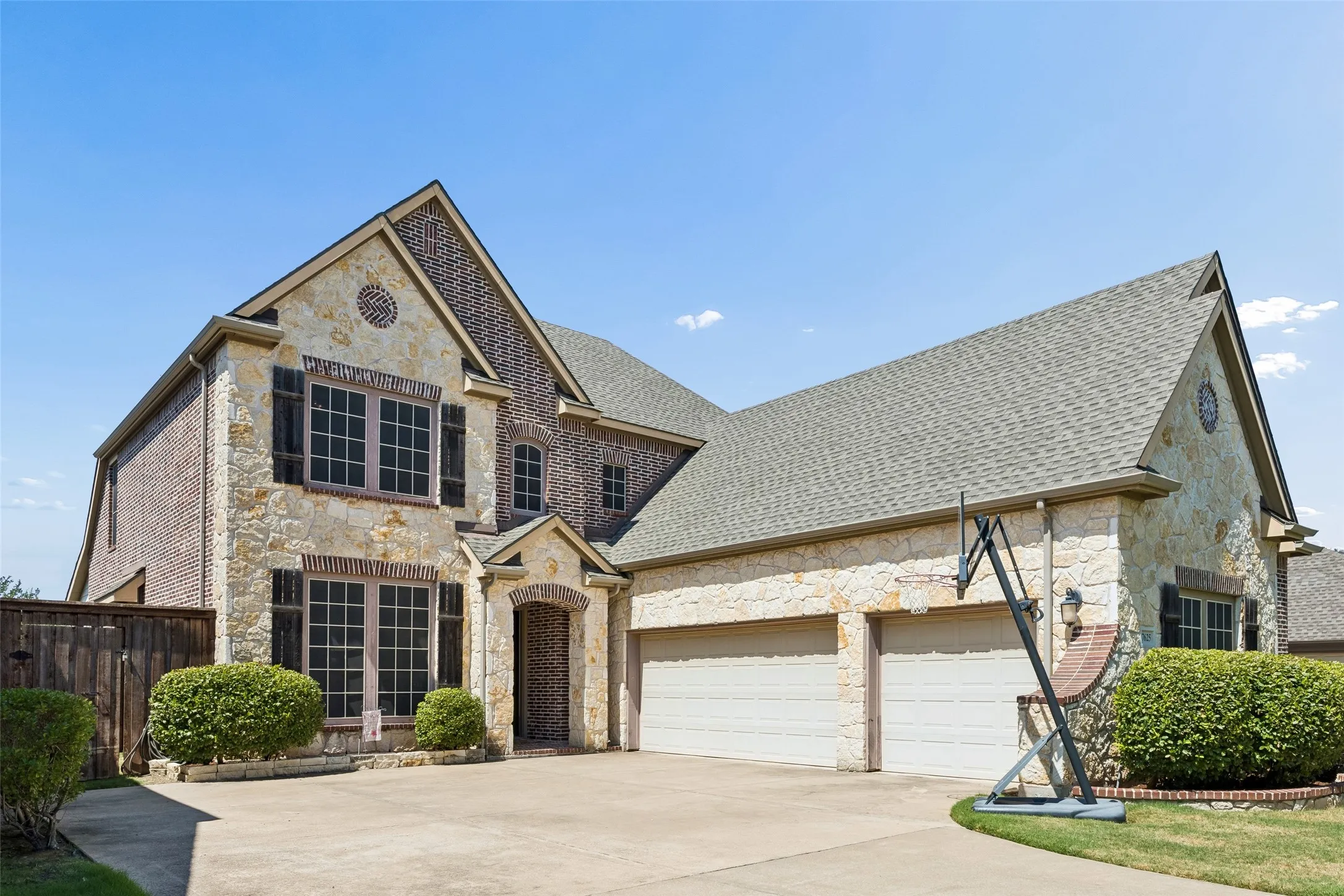 Welcome home! Check out the 3 car garage