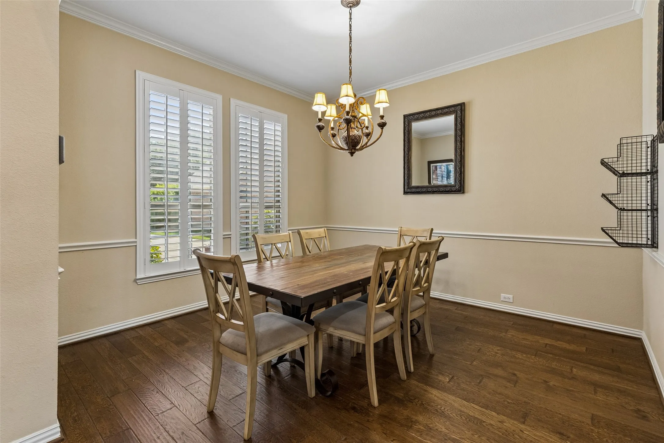 Hardwood-finish flooring, crown molding and wainscoting details