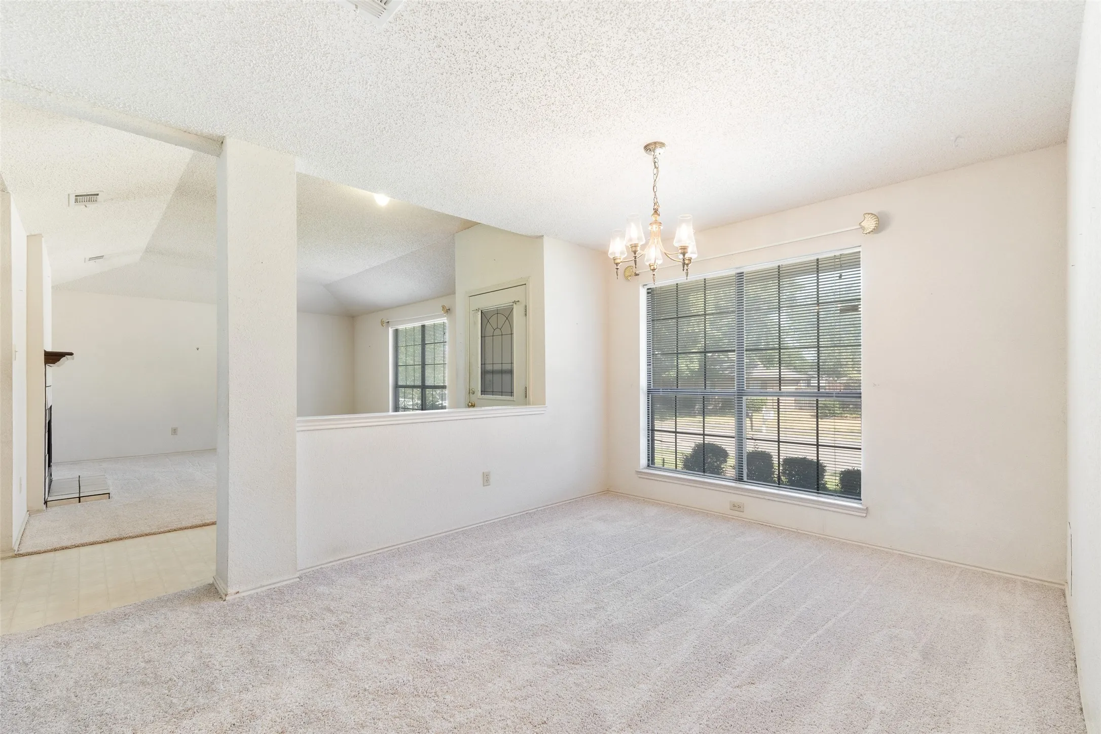 Another niced sized room with a large window to enjoy the view. Door to kitchen is directly behind.
