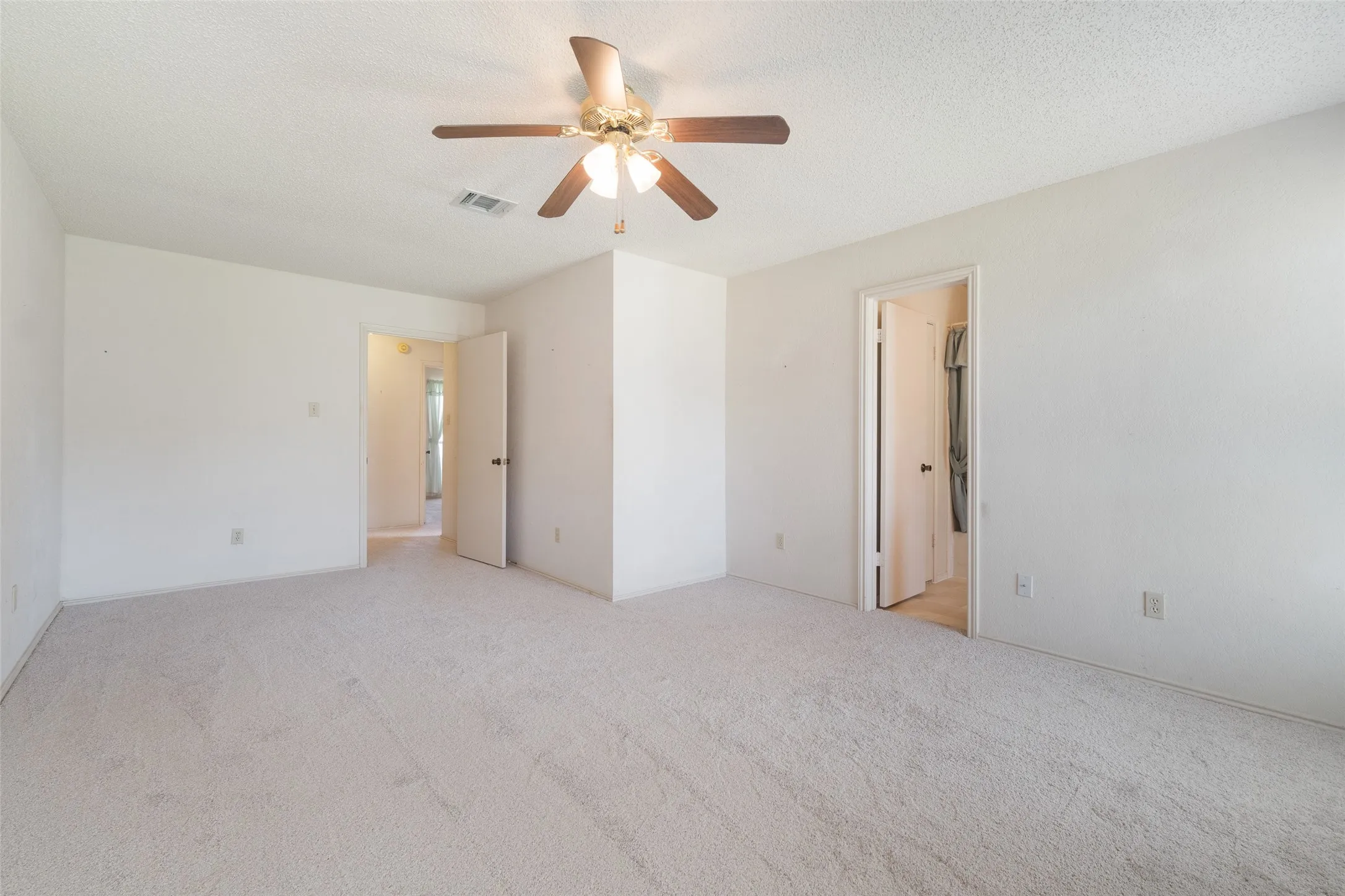 Owners retreat looking towards hall entry. Sitting area is directly ahead.