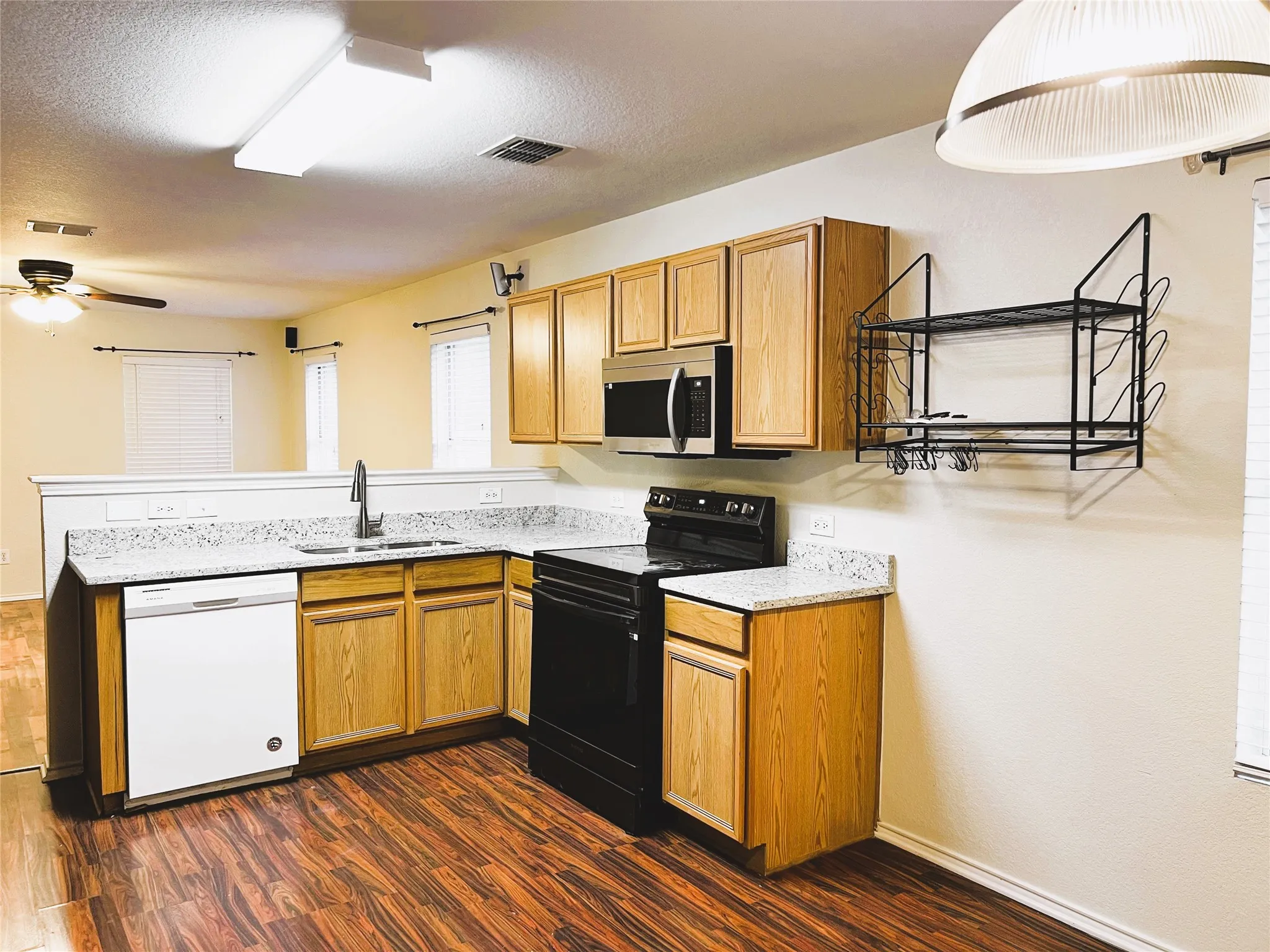Open kitchen and dining areas.