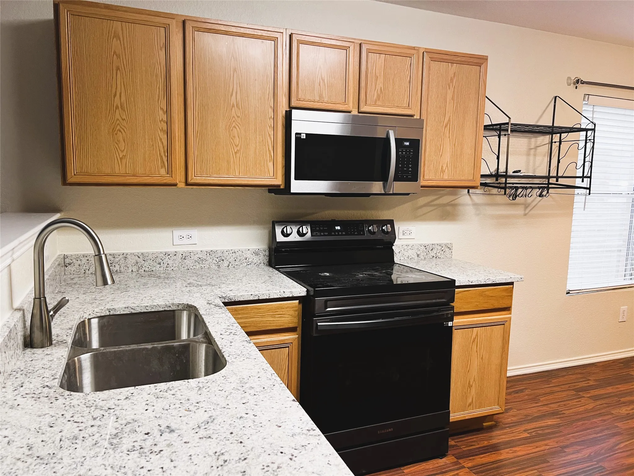 Recently installed granite countertops and sink.