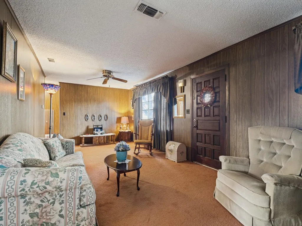 View of the living room from the fireplace wall