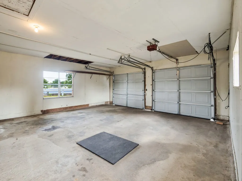 The oversized garage has two separate doors