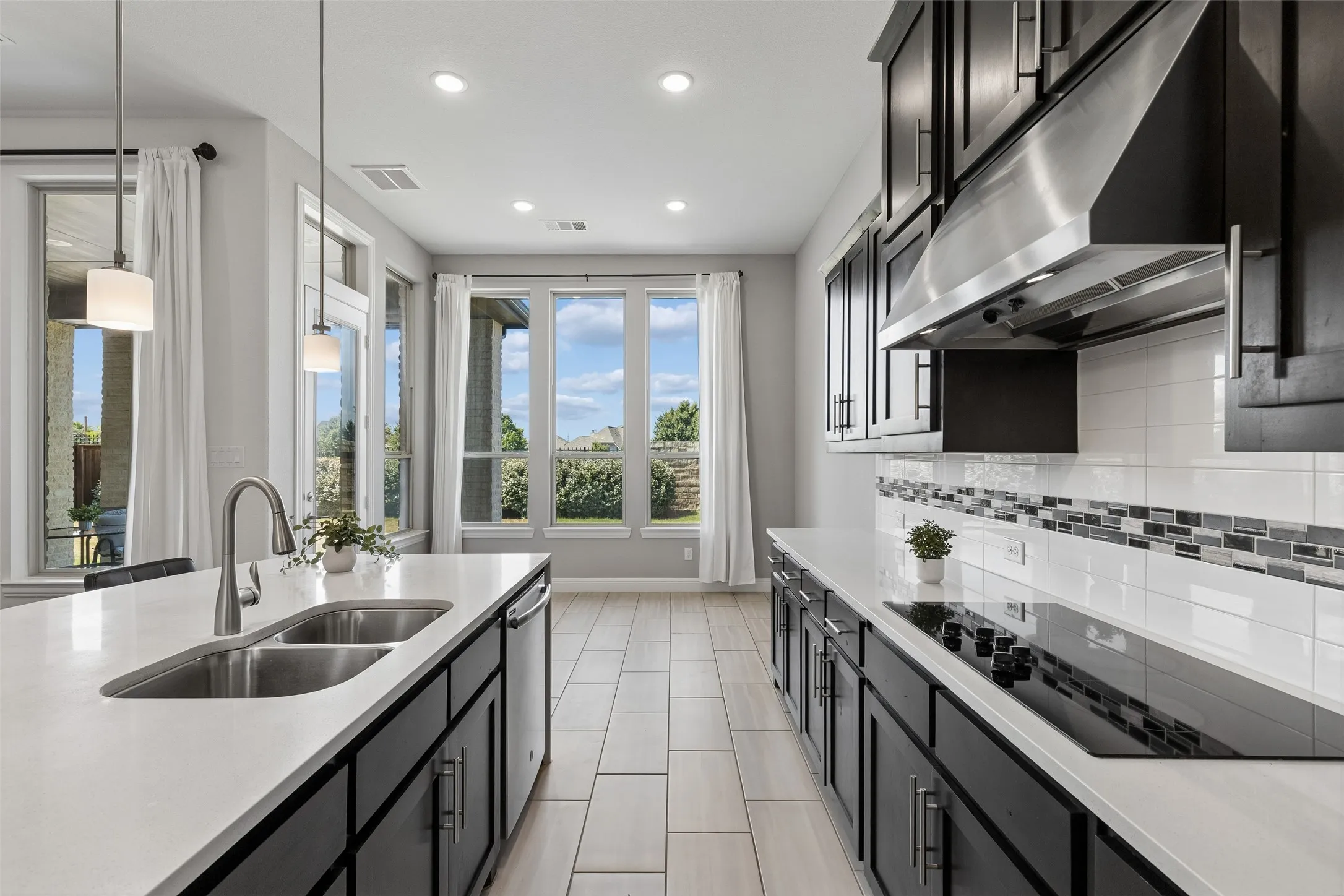From weekday dinners to a house full of friends, generous prep space, storage, and an oversized island give everyone room to gather. Plus ,capped gas connection at the cooktop location, offering flexibility for a future gas cooktop. Buyer to verify.