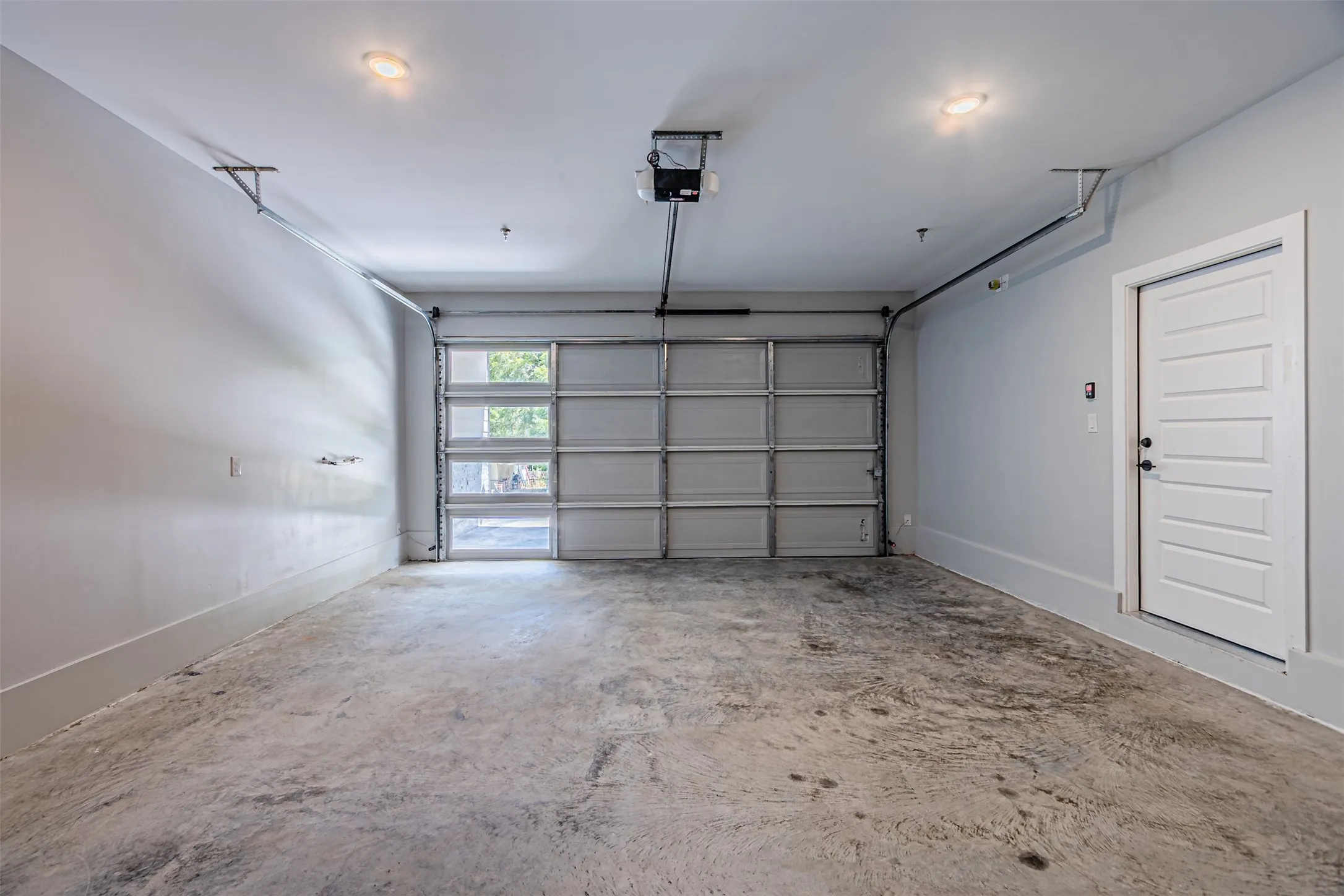 Garage is pre-plumbed for installation of whole house water softening or treatment system. Fire suppression sprinkler heads are barely noticeable on ceilings and walls throughout the house.