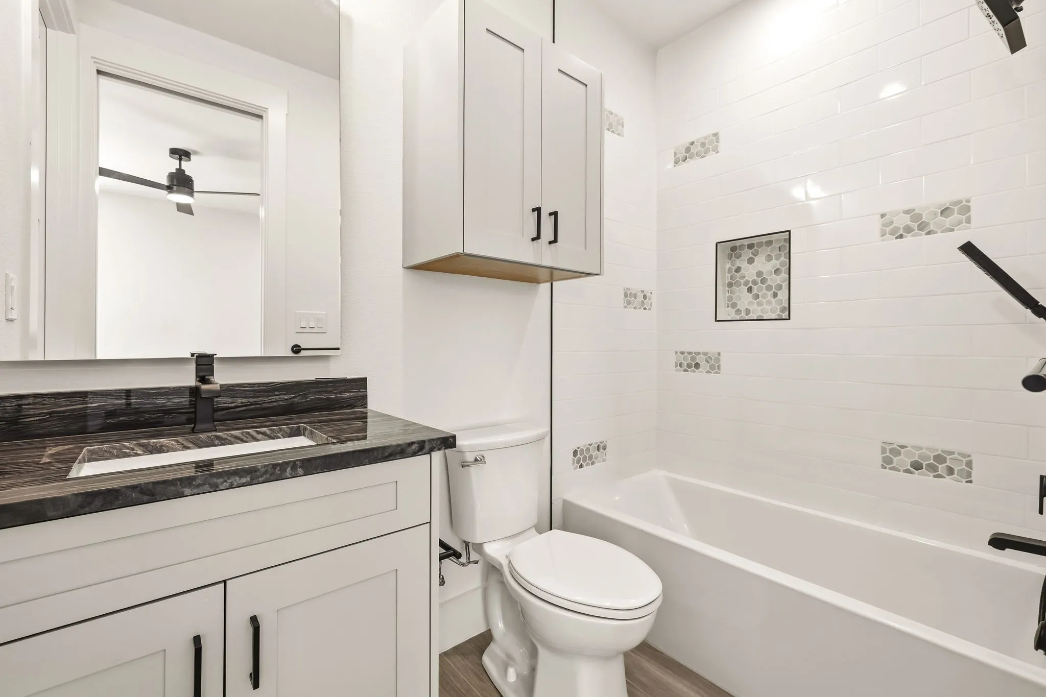 Ensuite bathroom to upstairs bedroom 2. Access to walk in attic storage