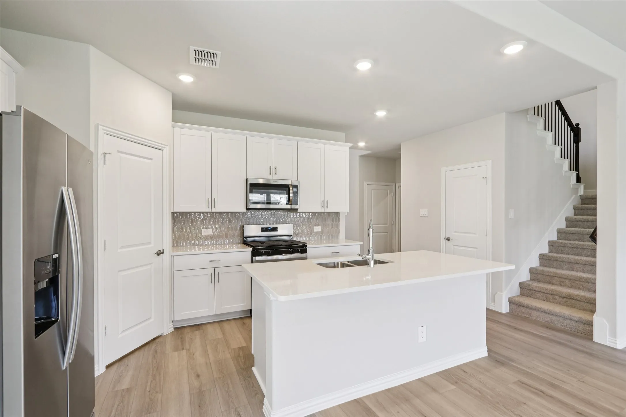 Photo is not of the actual home, but is an inspirational photo of builder’s model home and may depict options, furnishings, and/or decorator features that are not included.