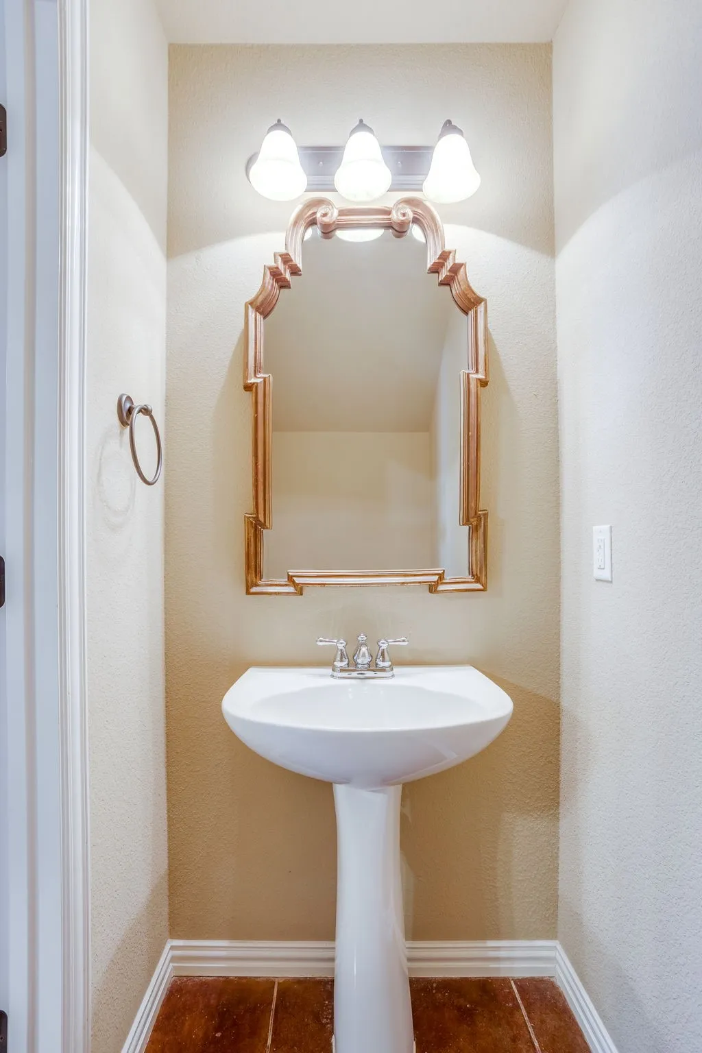 Half bathroom located off of living room.