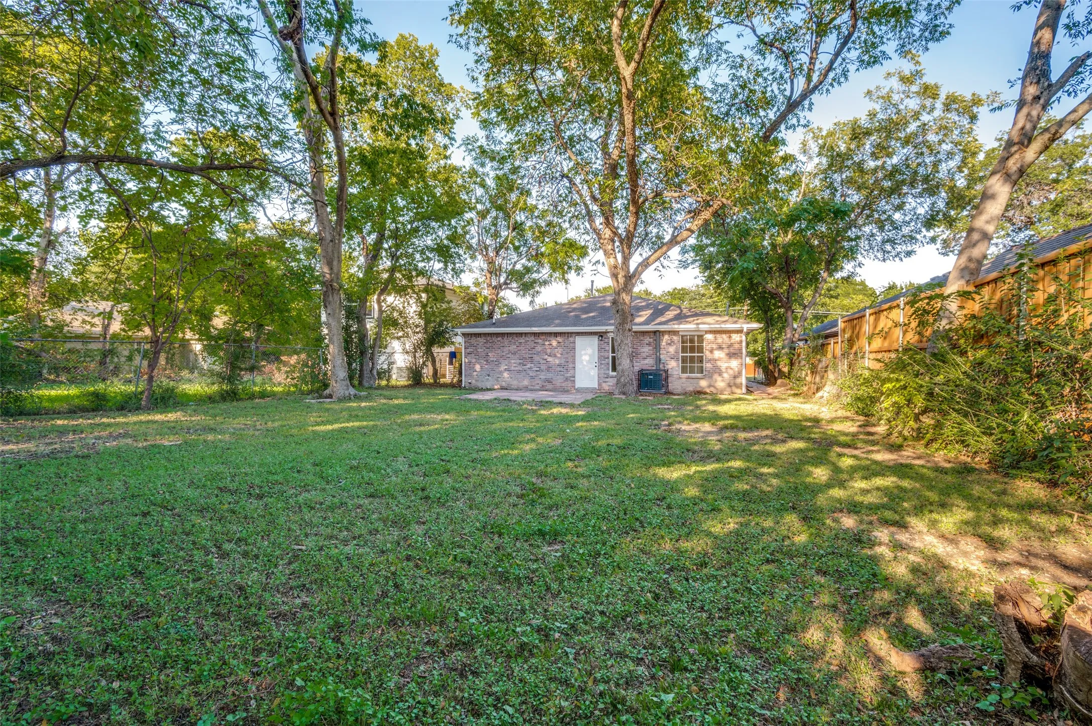View of fenced backyard