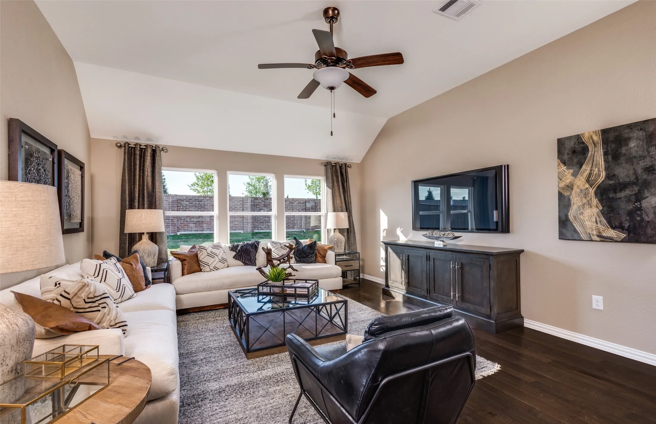 *Model Representation - Spacious gathering room with large windows