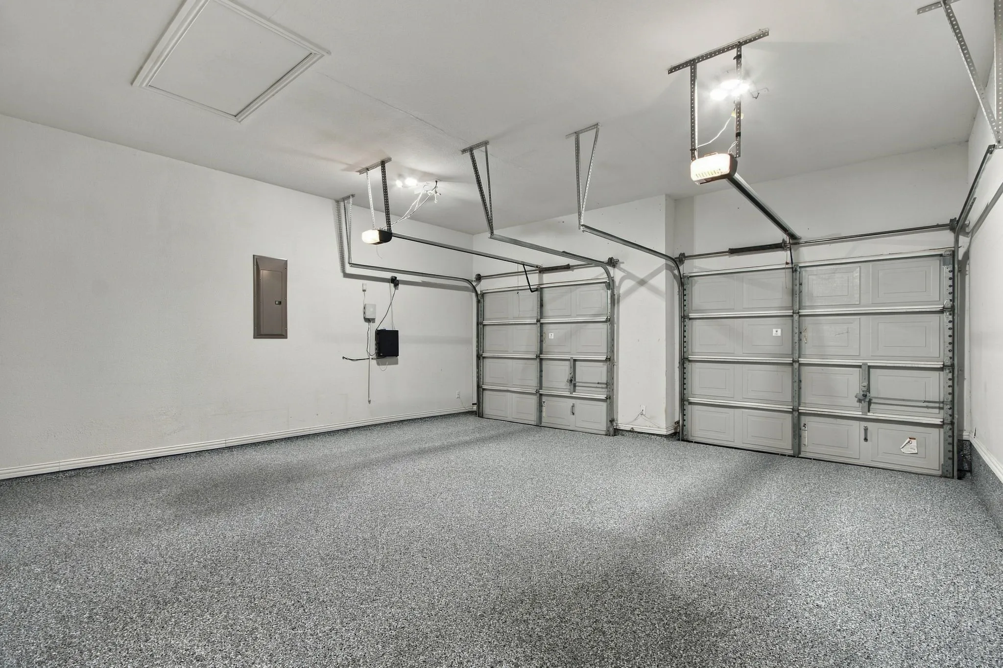 Garage updated with custom floor finish.