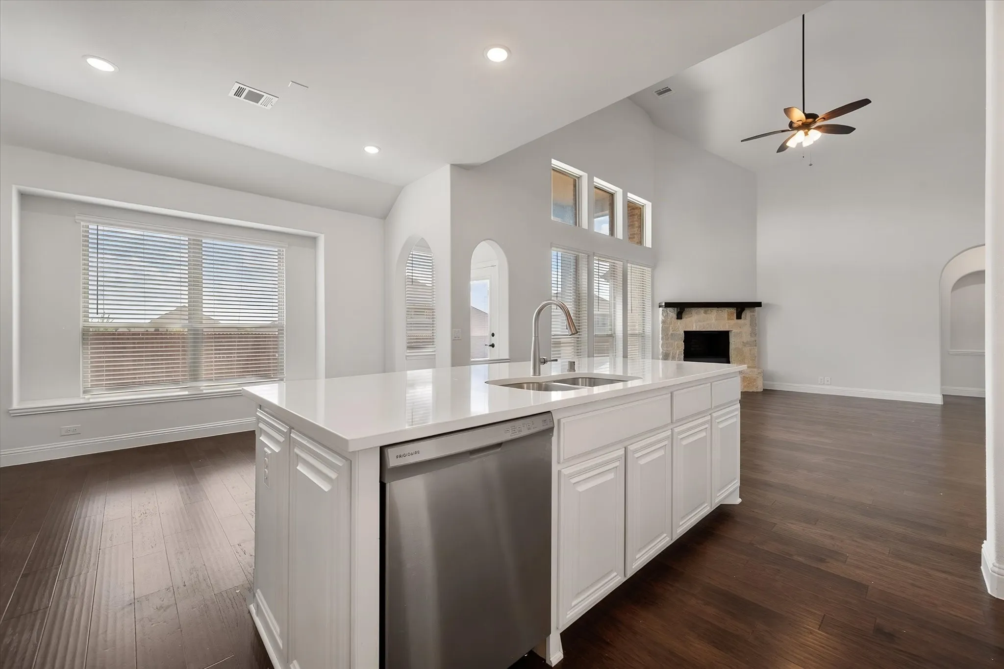 The kitchen offers stainless steel appliances and opens up into the breakfast area.