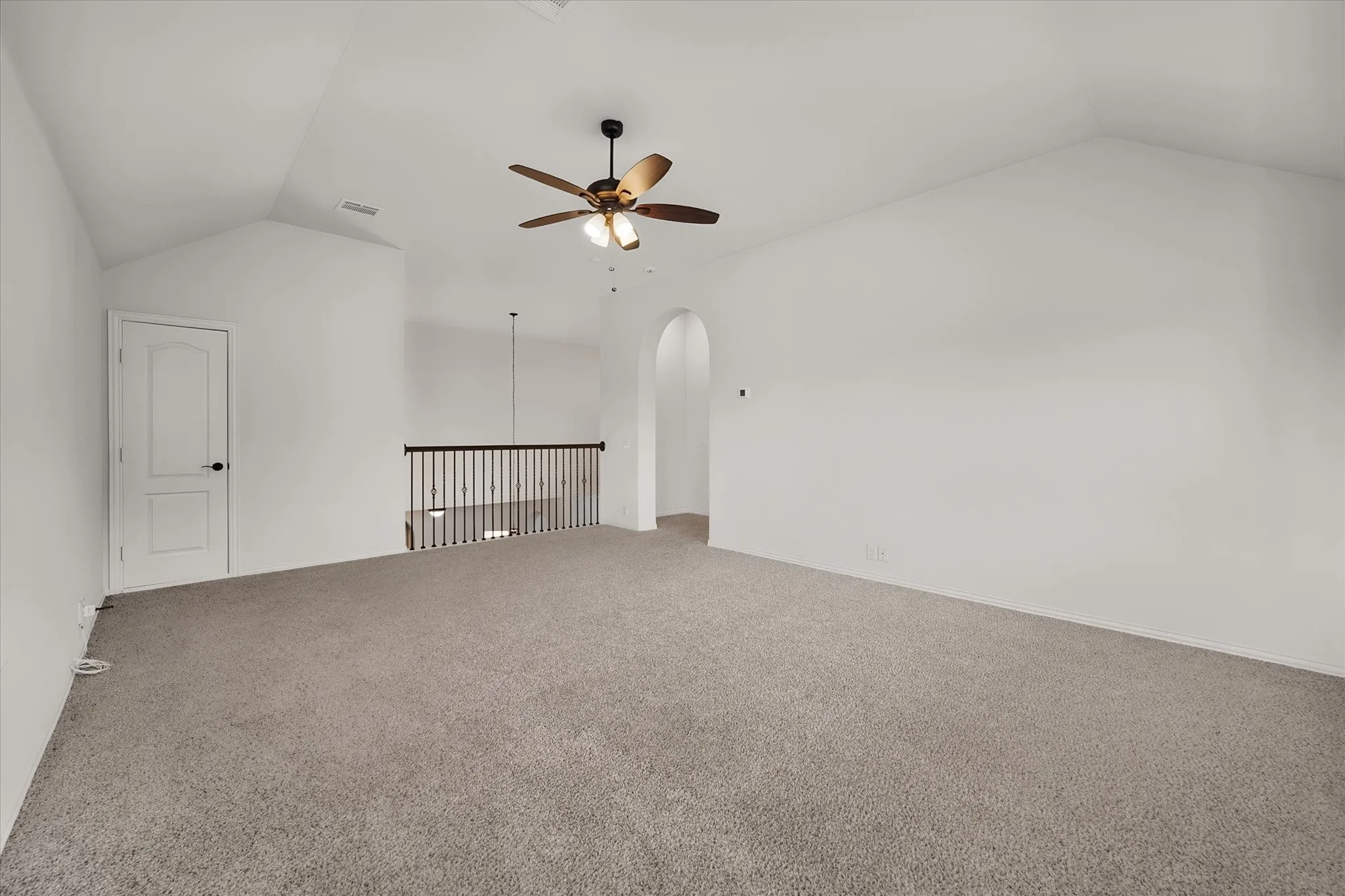 From this angle you can see the railing that overlooks the entry below — Gives the open, airy feel connection between floors.