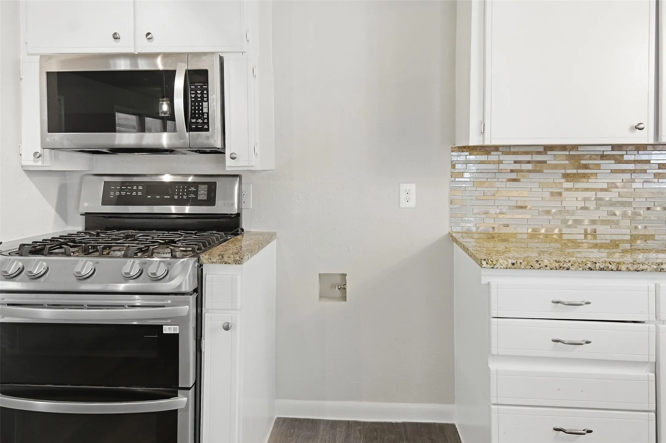 Awesome kitchen with stainless steel appliances, granite counter-tops and gas cooking!
