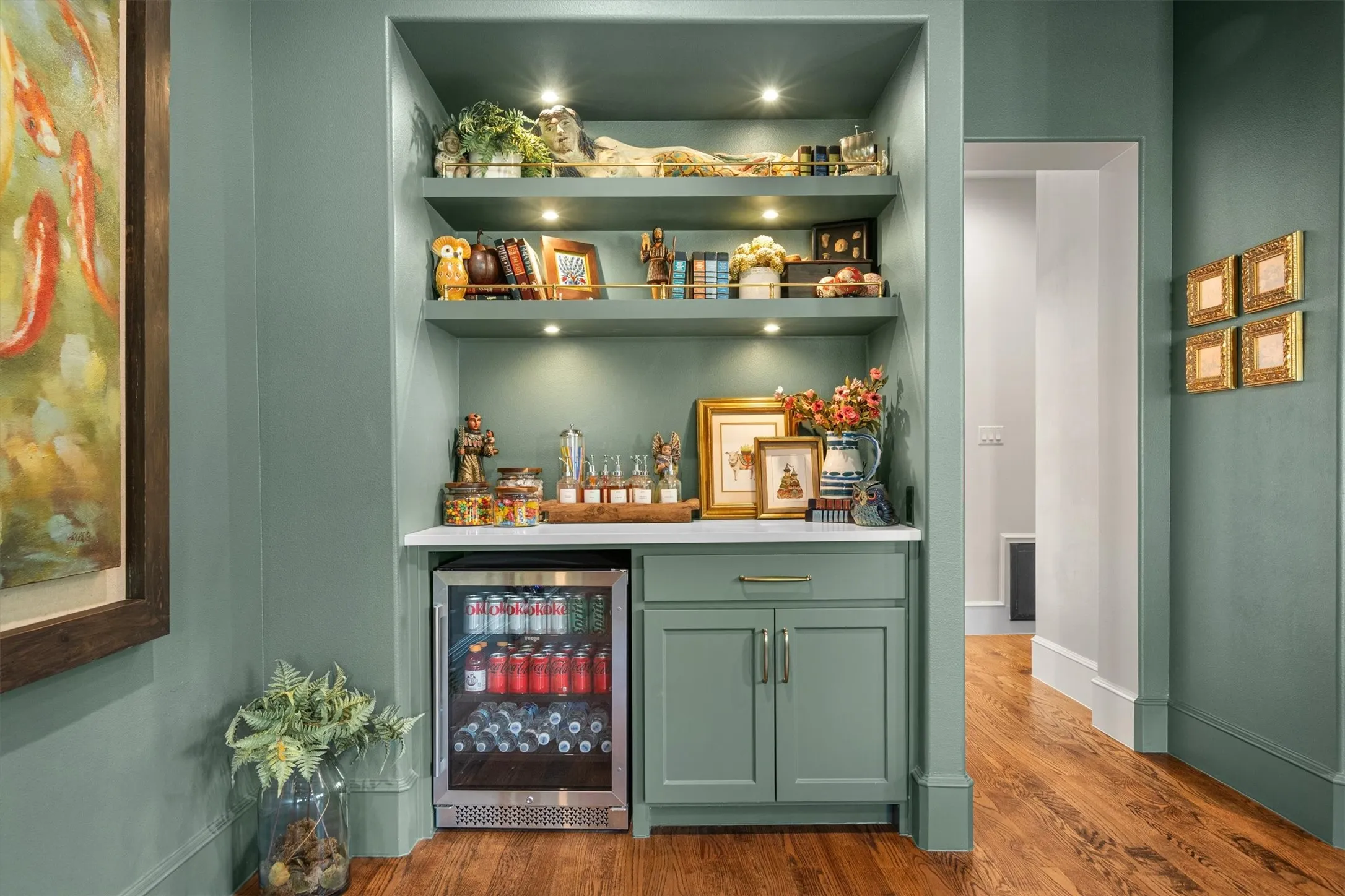 Custom built-in bar with beverage cooler — perfect for entertaining in this flexible bonus space.