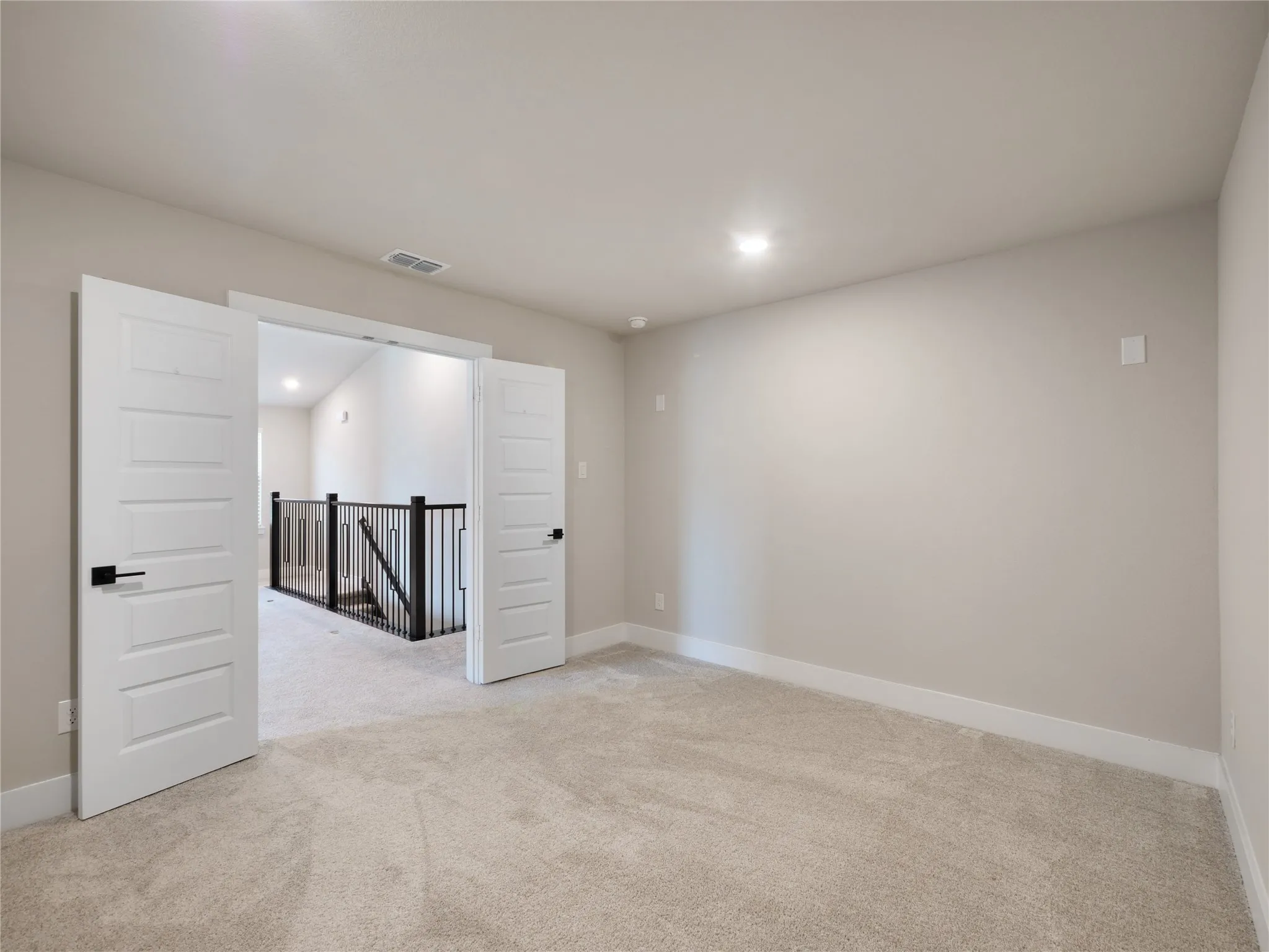 Media room is located off the Game Room and ready for your designer touches.